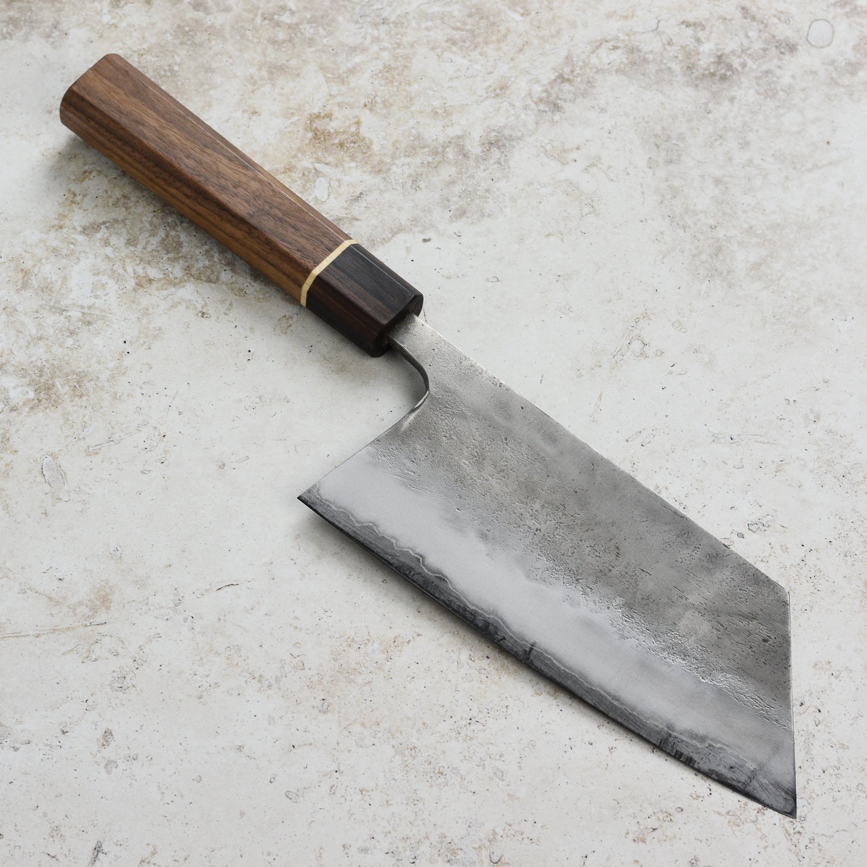 Side view of the Matsubara Aogami cleaver displaying its ergonomic handle and beautiful Nashiji pattern.