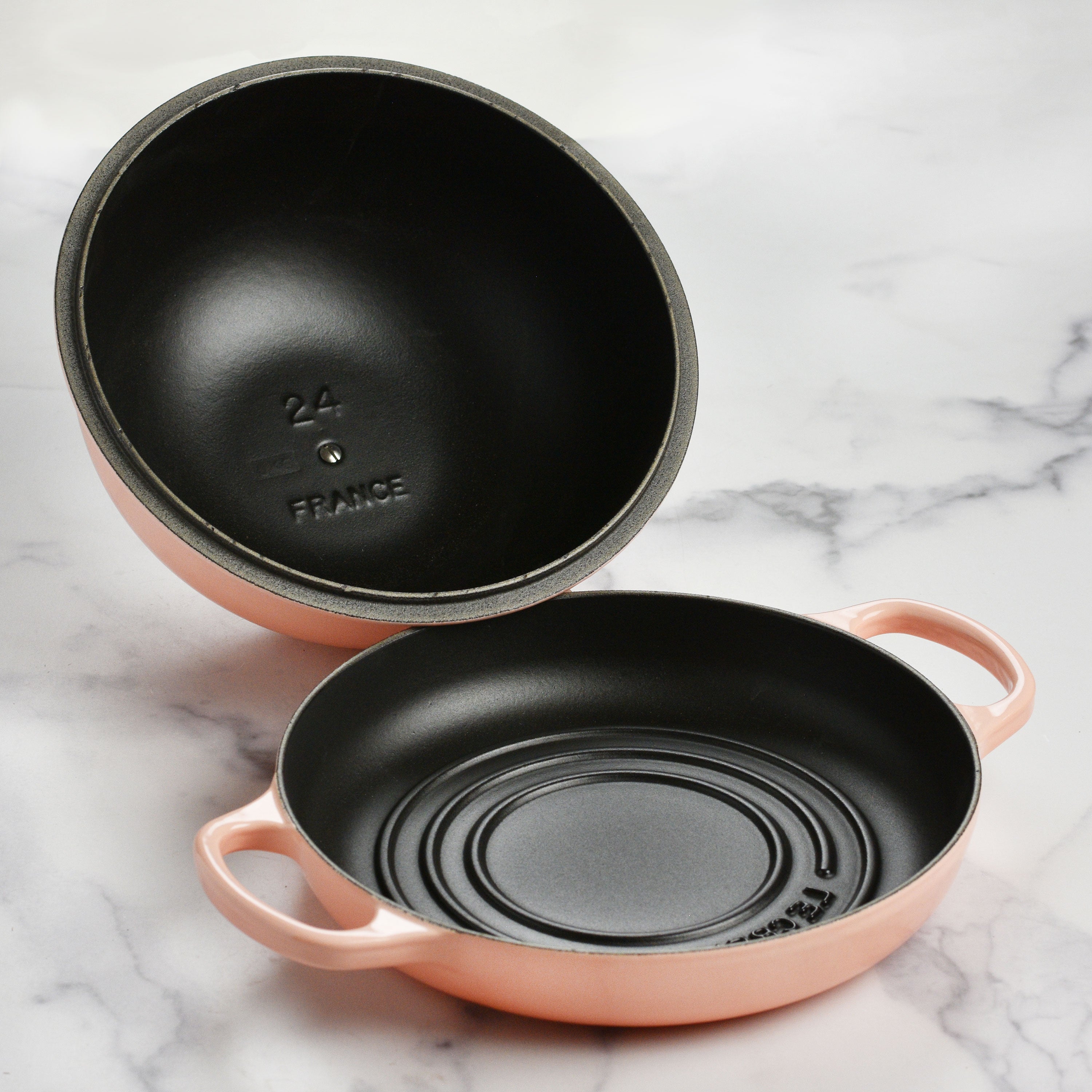 Close-up of the ergonomic handle and stainless steel knob on Le Creuset bread oven