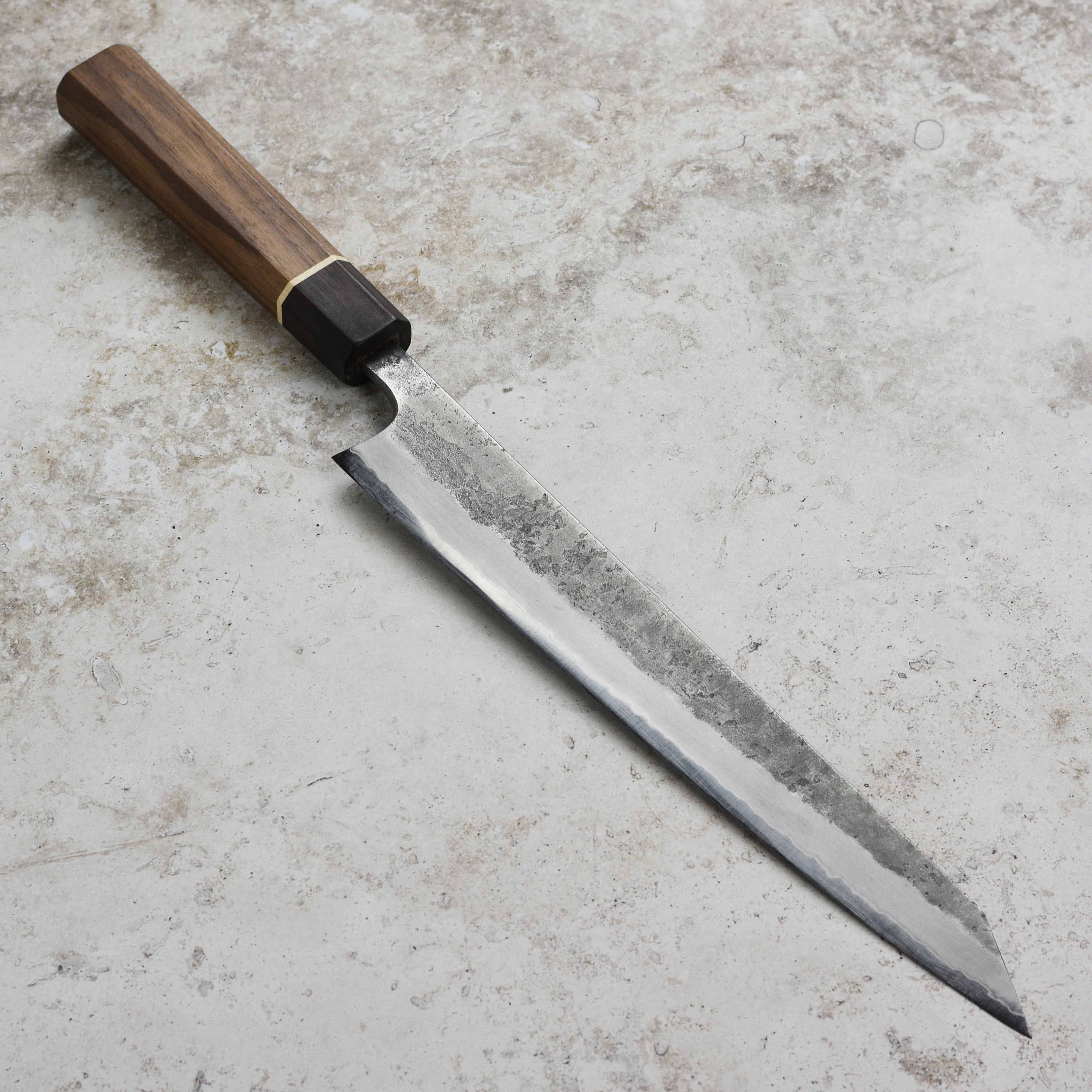 Matsubara Aogami Sujihiki knife in action, beautifully slicing sushi.