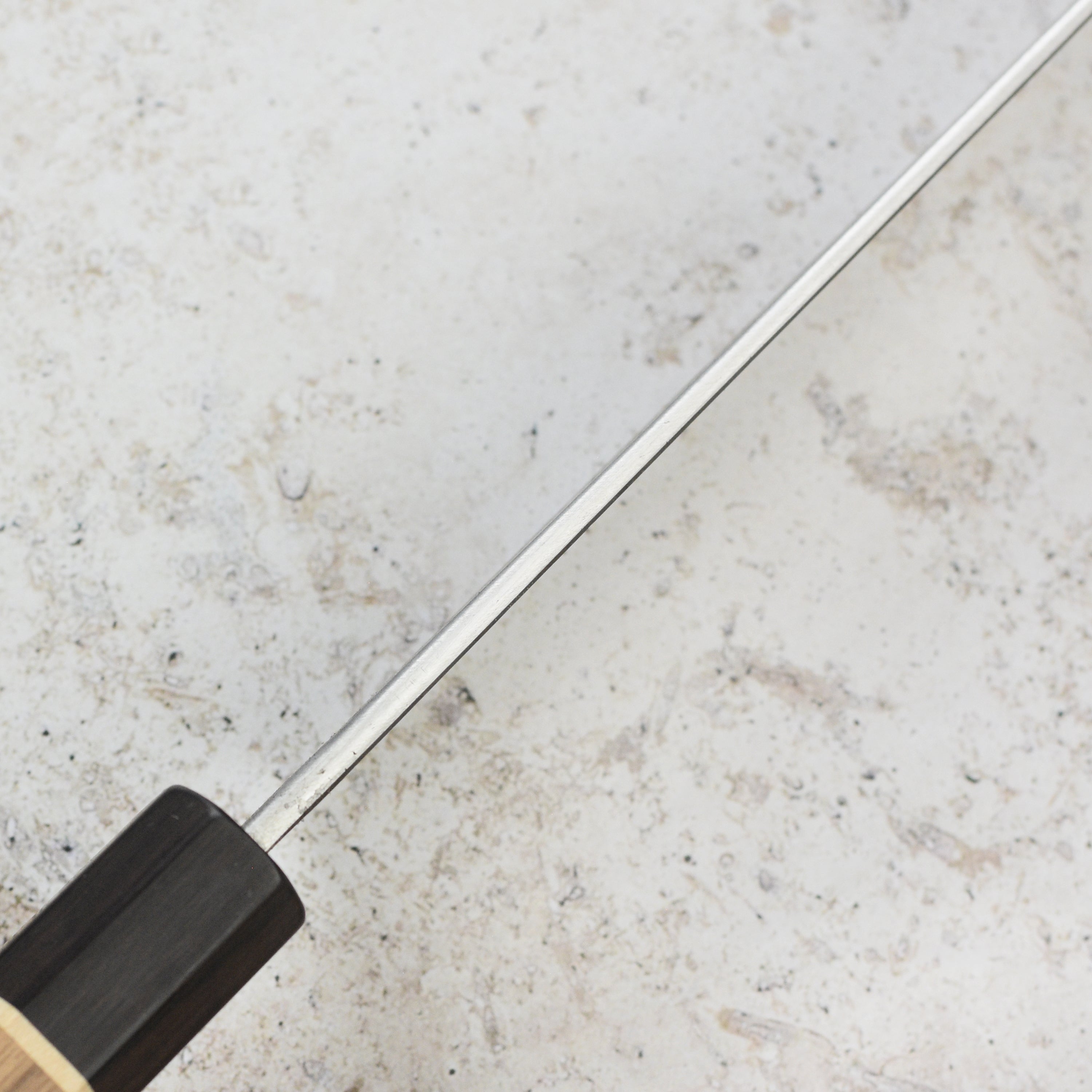 Matsubara Aogami Sujihiki knife in action, beautifully slicing sushi.