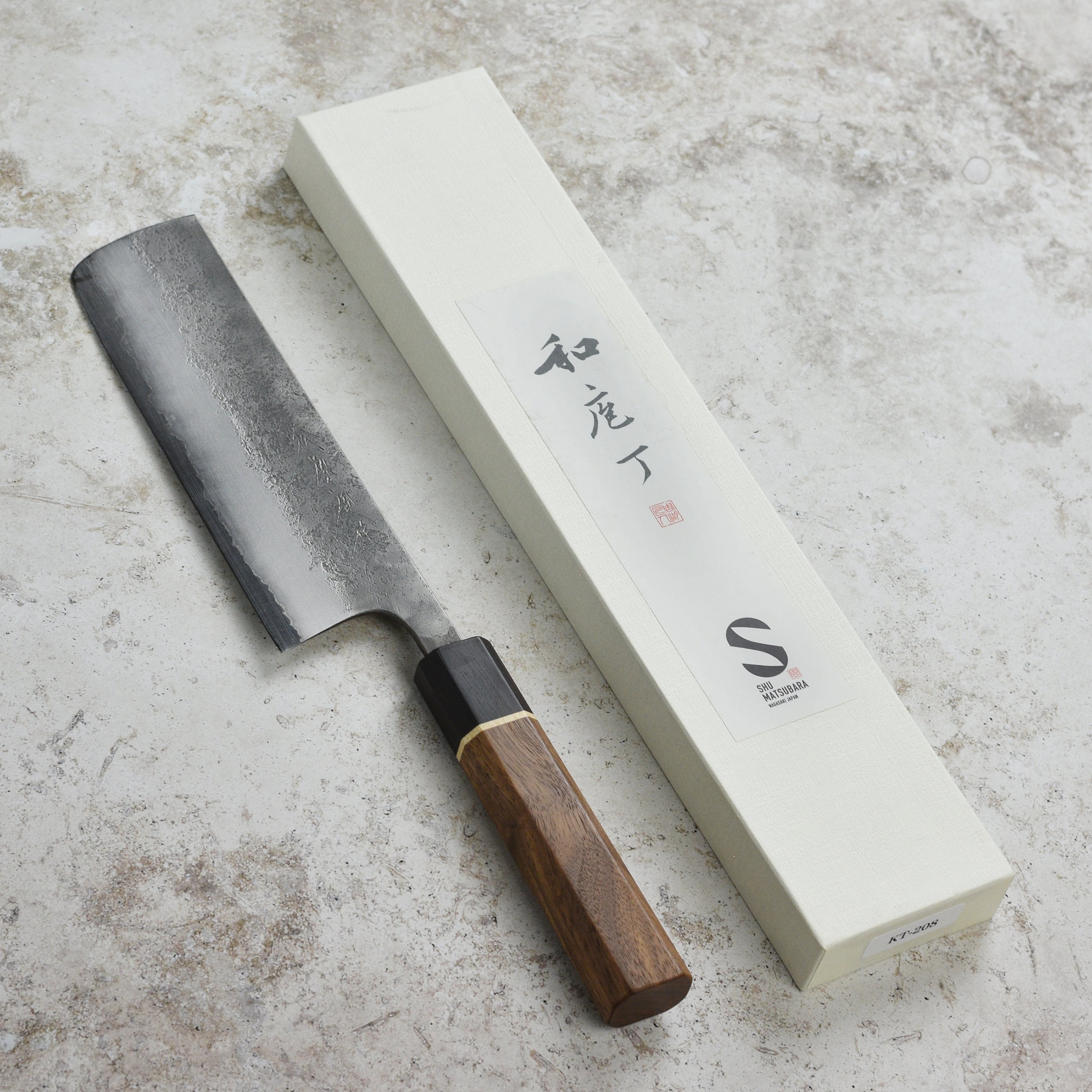 Matsubara Nakiri knife showcasing its sharp blade and ergonomic handle.