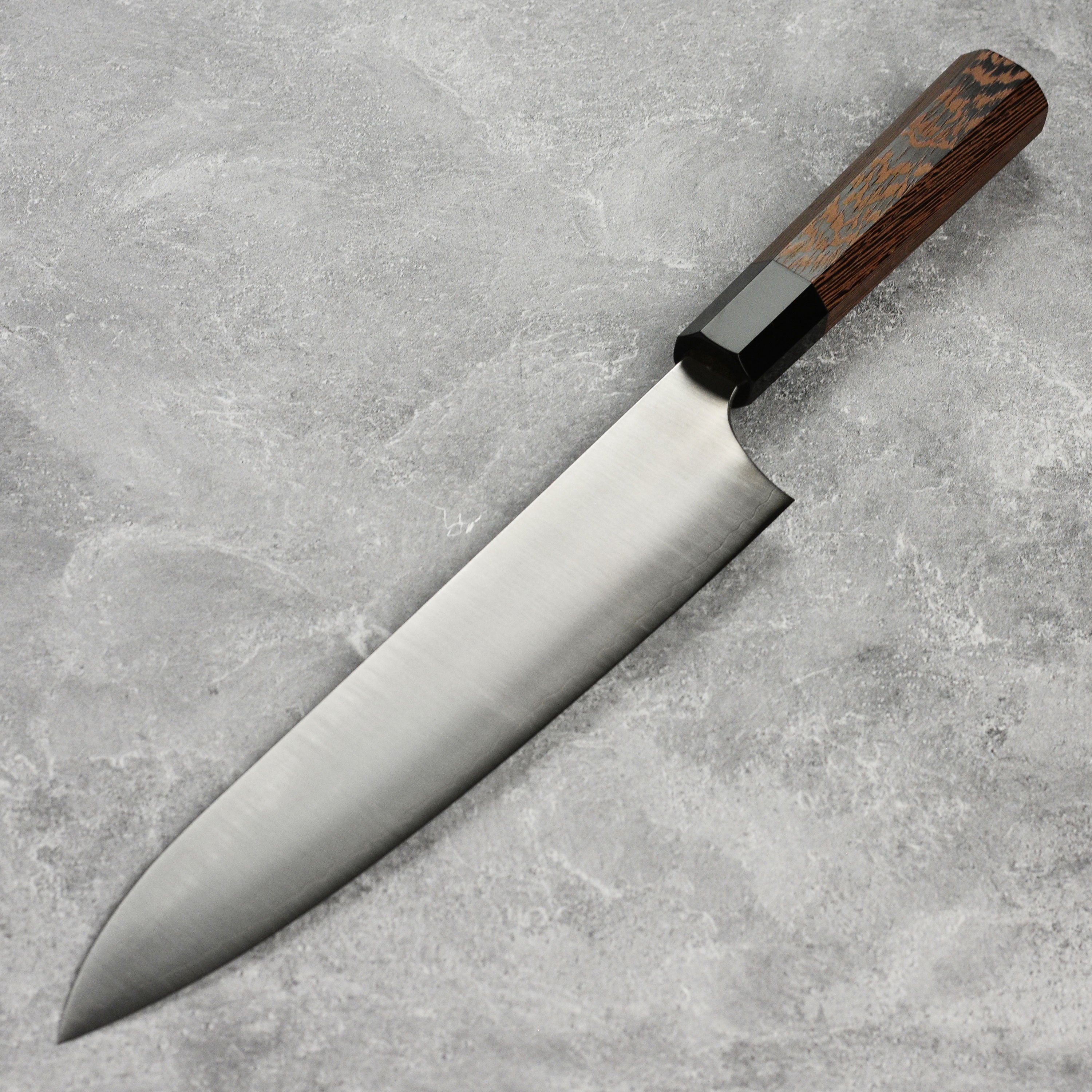 Japanese chef knife with ergonomic handle and sleek design, perfect for home cooking