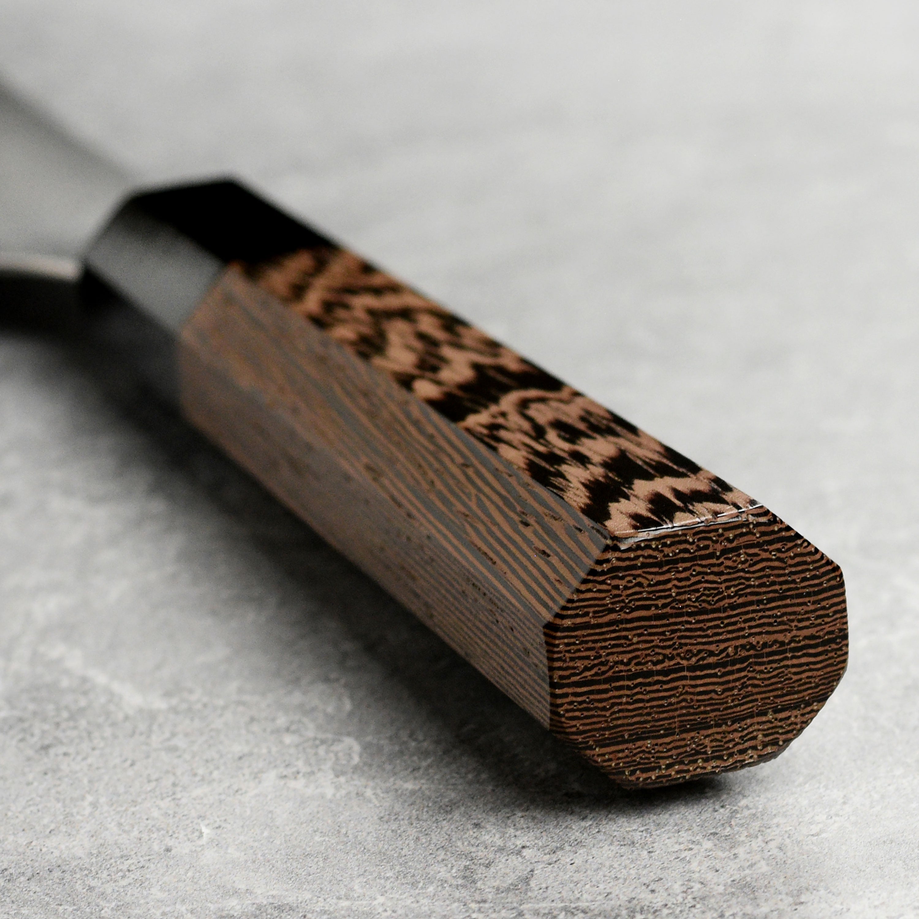 Japanese chef knife with ergonomic handle and sleek design, perfect for home cooking