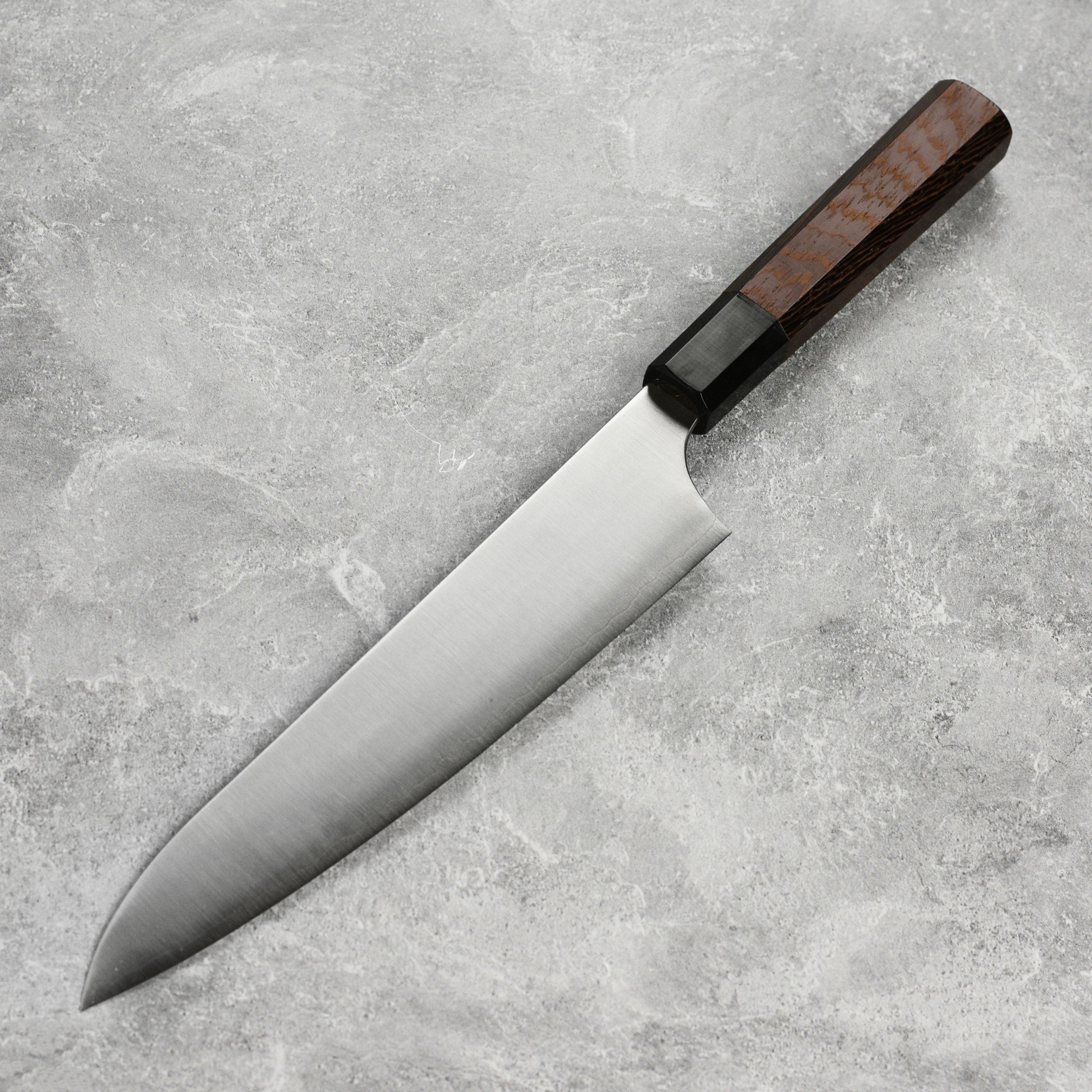 Japanese chef knife in use for slicing vegetables