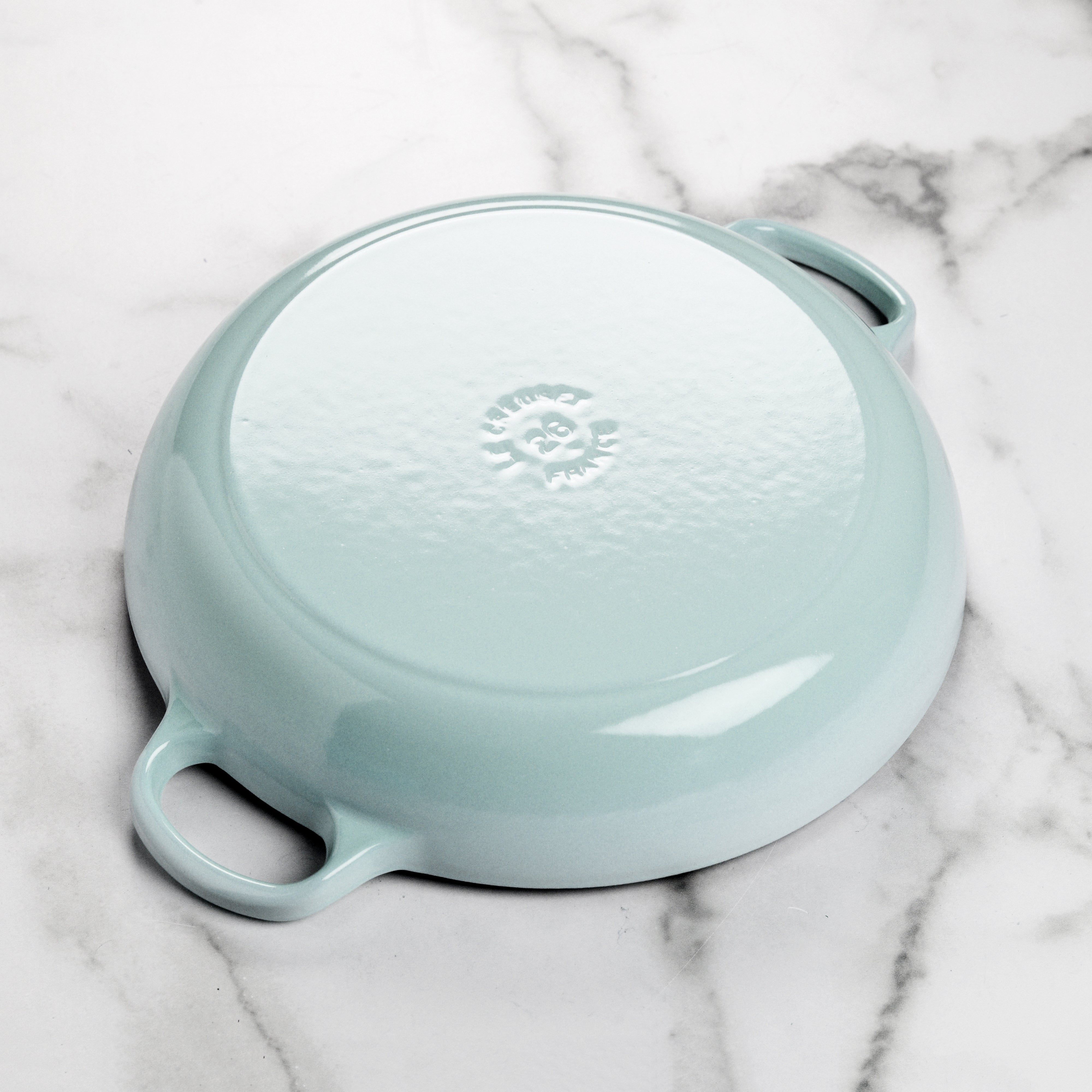 Cooking a delicious stew in the Sea Salt Petal Enameled Cast Iron Braiser.