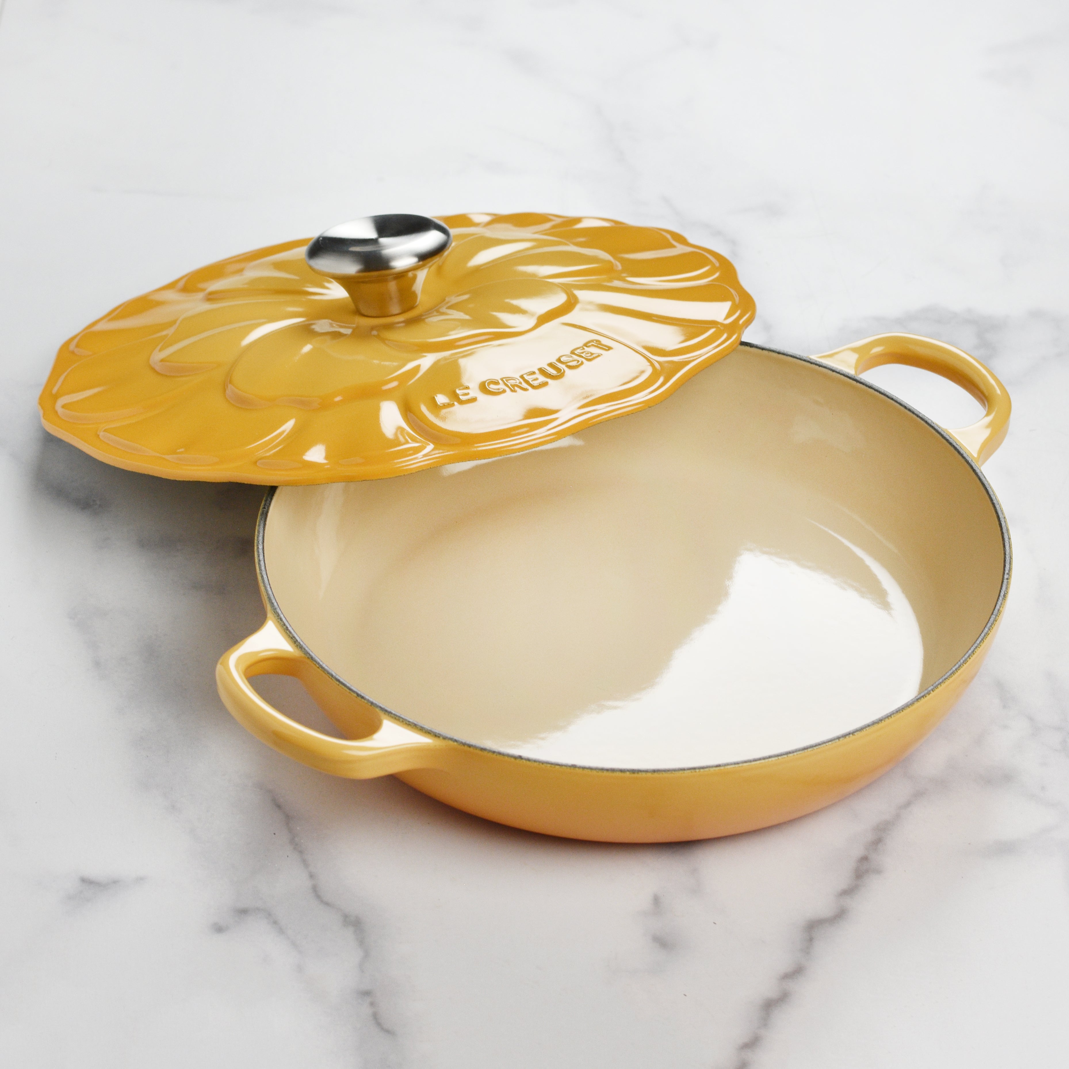 Le Creuset enamel cast iron braiser with lid on a kitchen countertop