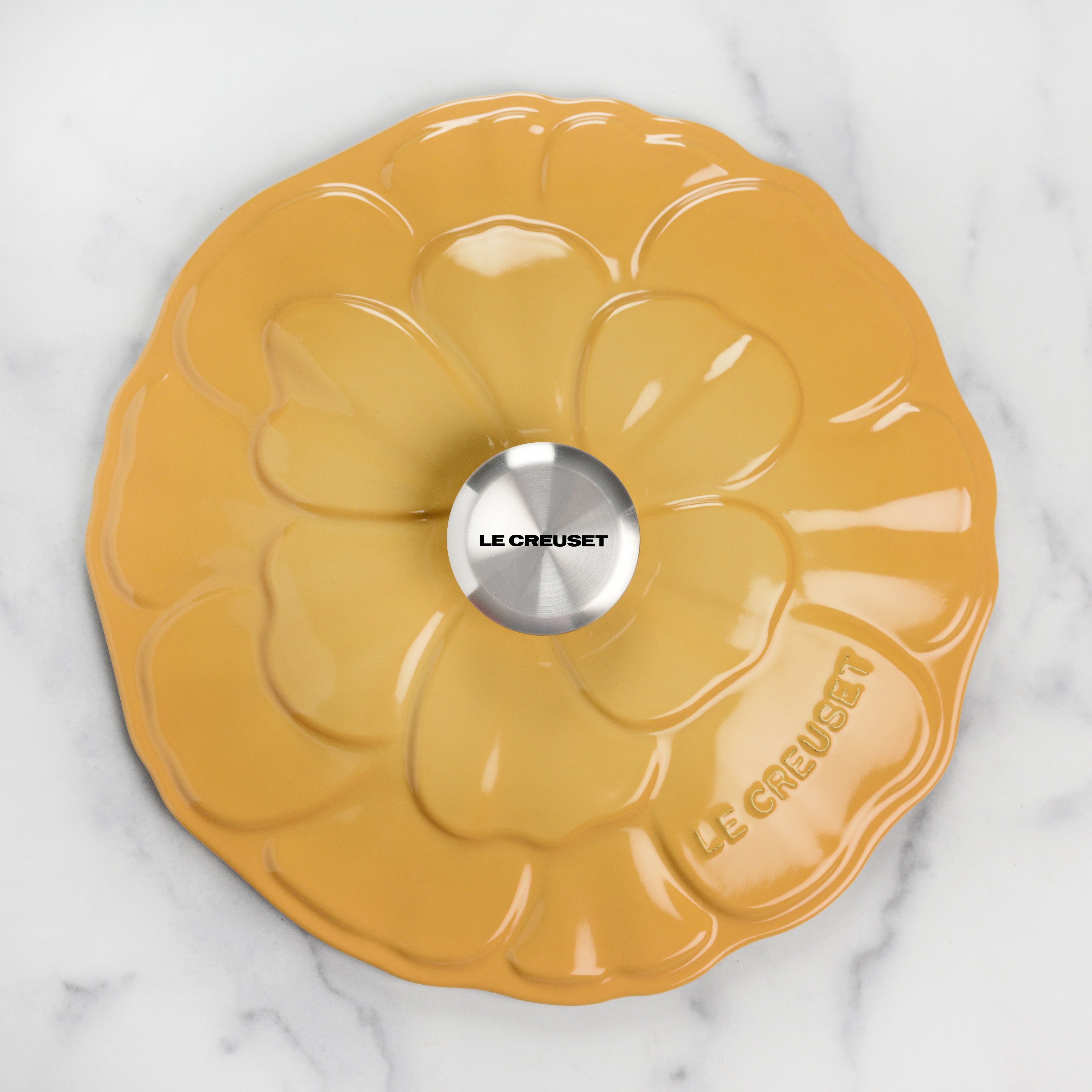 Le Creuset enamel cast iron braiser with lid on a kitchen countertop