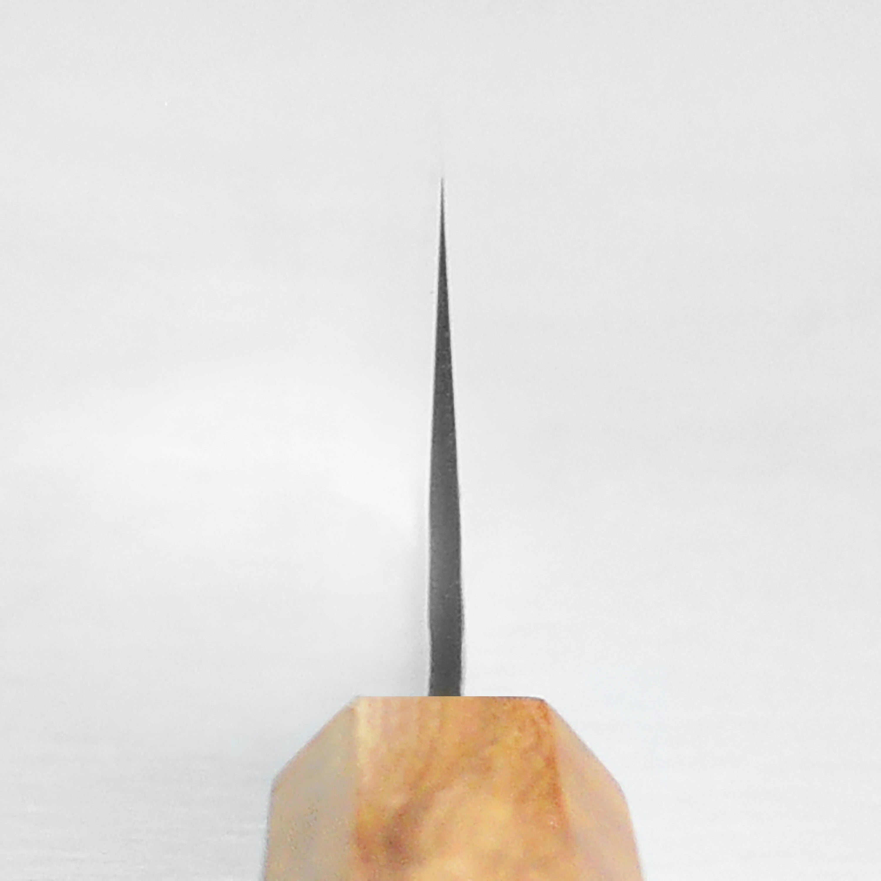 Close-up of the Enso Olivewood handle, emphasizing the quality and design for chefs.