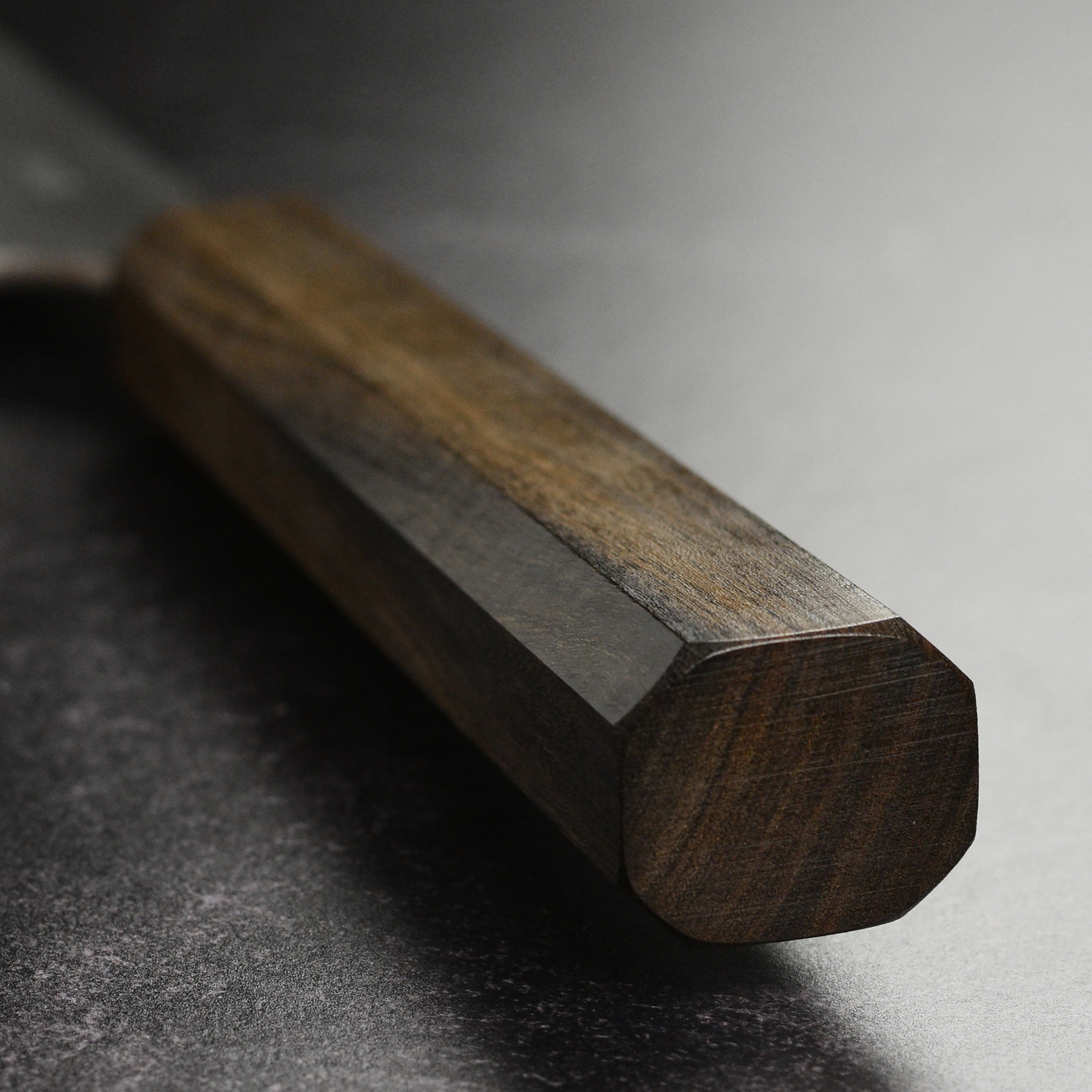 Chef using the Yoshikane Kiritsuke knife for slicing vegetables.