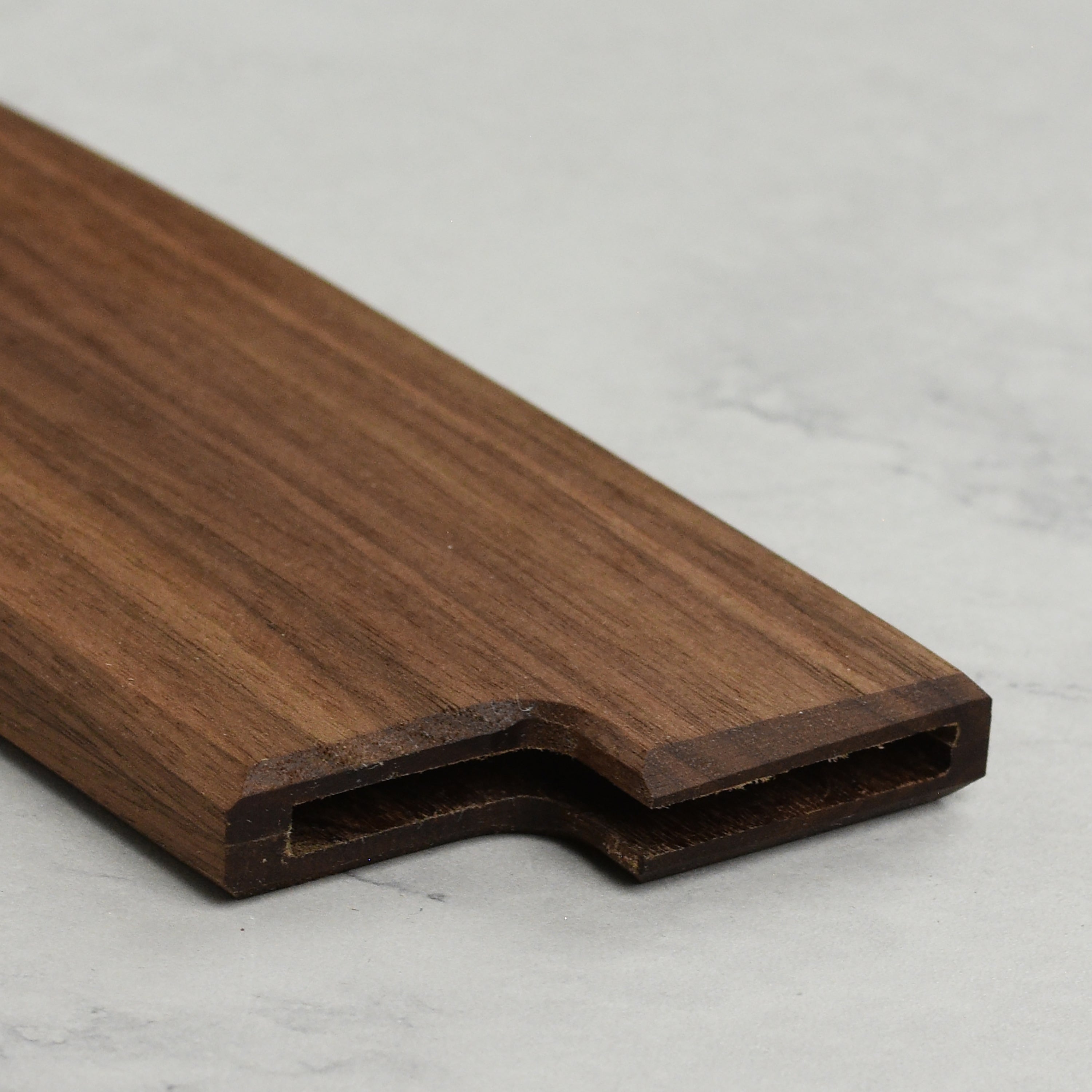 Top-down angle of the saya displaying the knife fitting snugly inside for professional storage