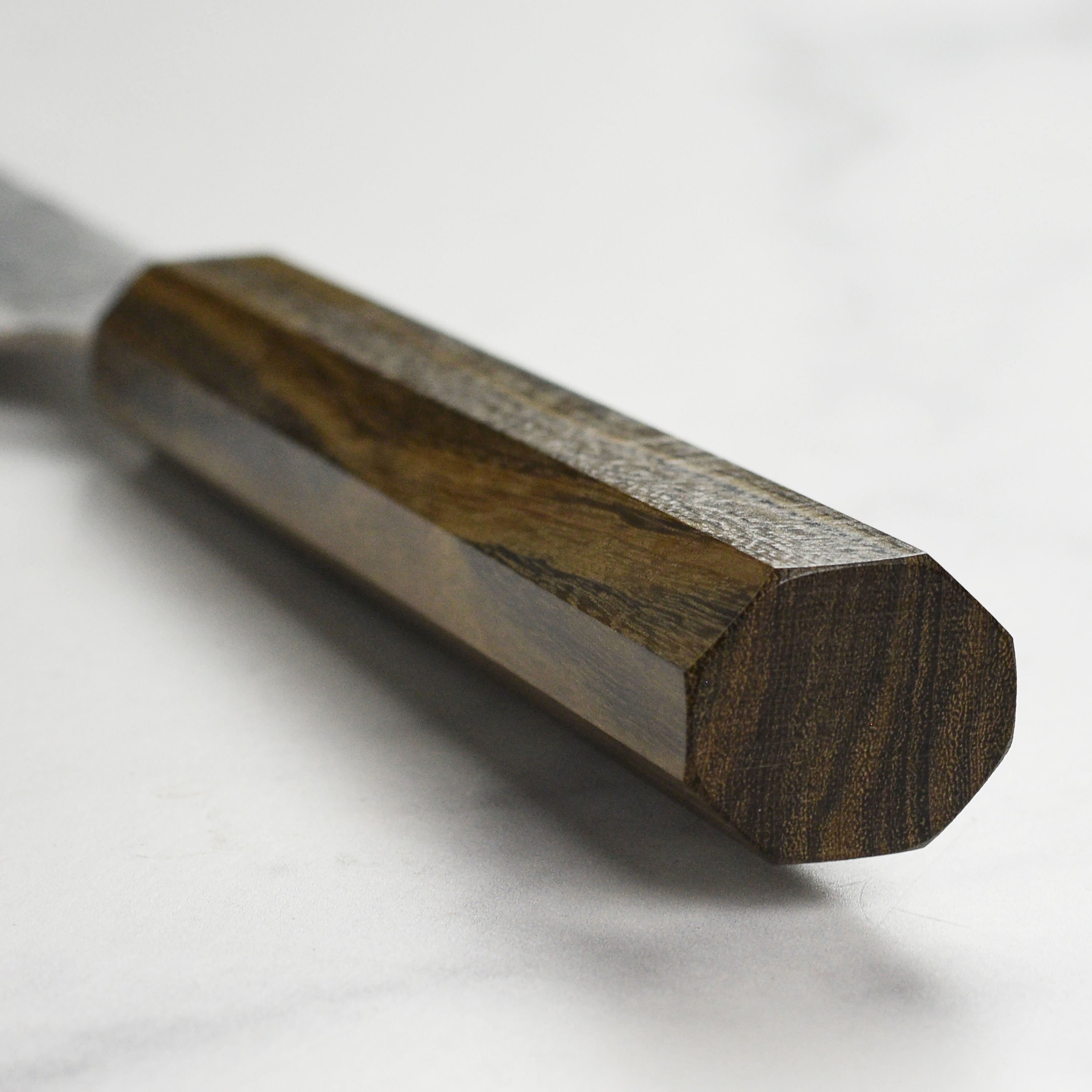 Detail shot of the Tsuchime finish on the Japanese Kiritsuke chef knife