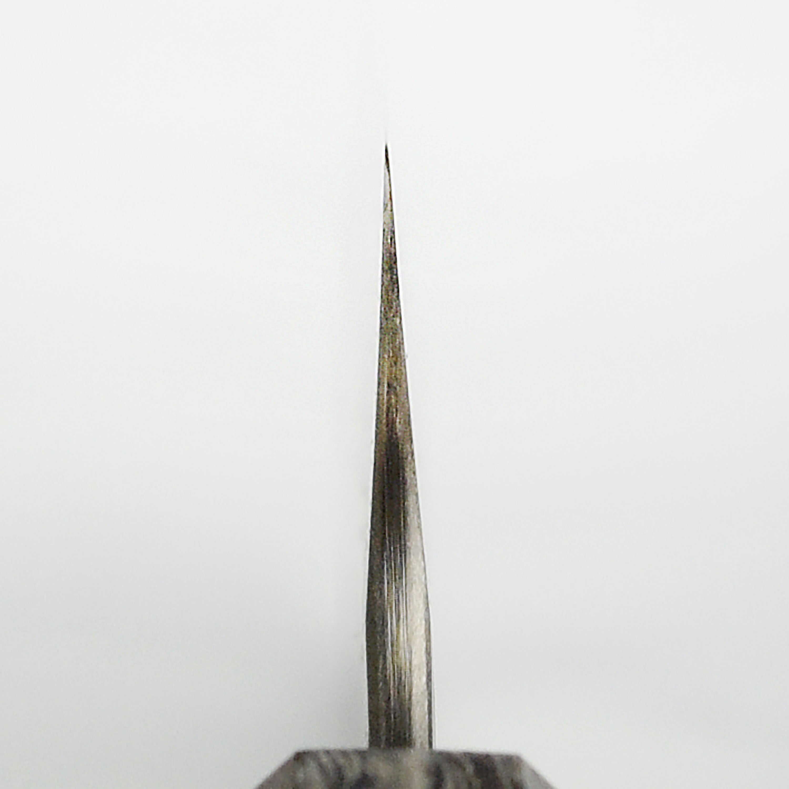 Close-up of the Nigara SG2 bunka knife highlighting its sharp edge and premium design.