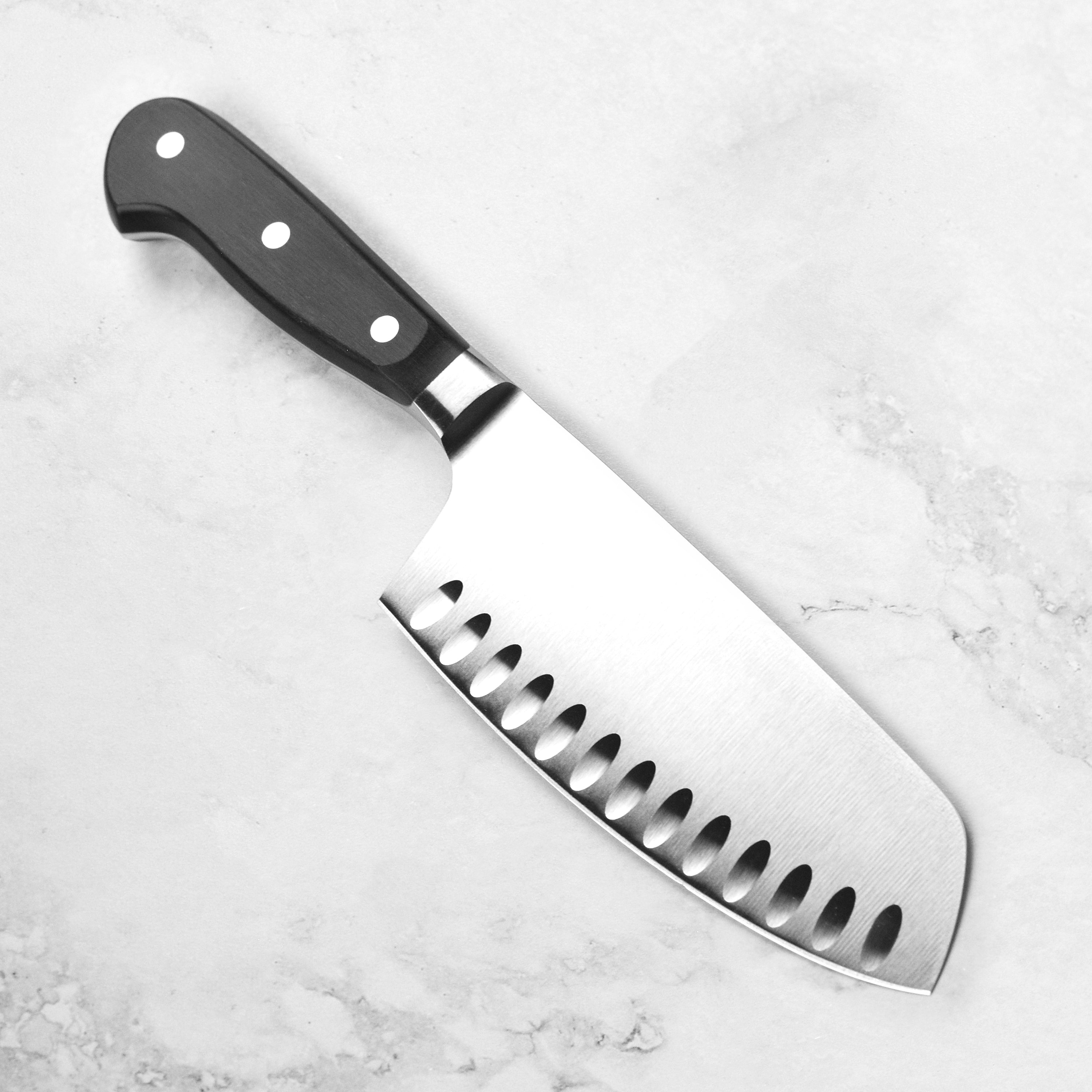 Top-rated cooking knife for chefs, featuring full tang construction and hollow edge design