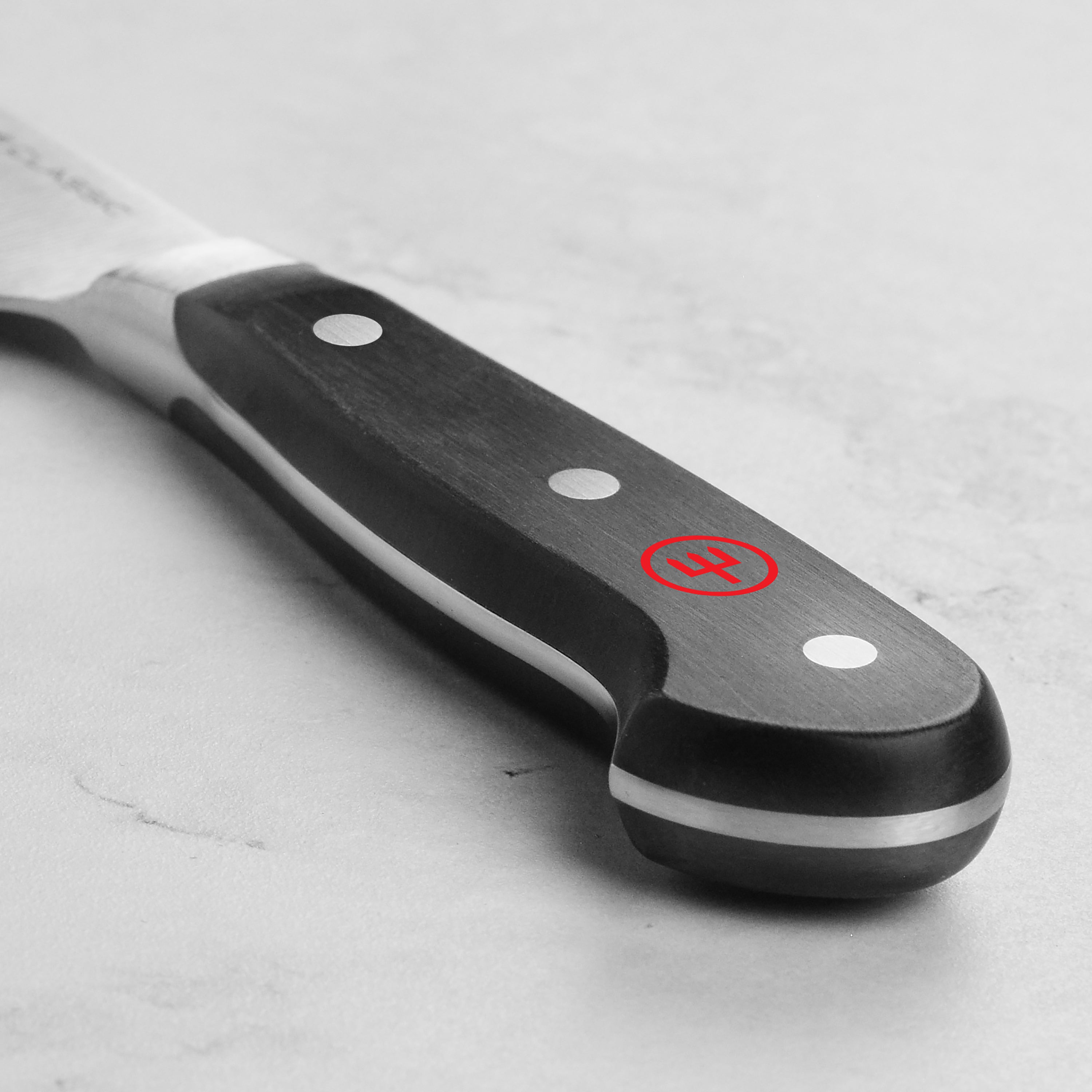 Top-rated cooking knife for chefs, featuring full tang construction and hollow edge design