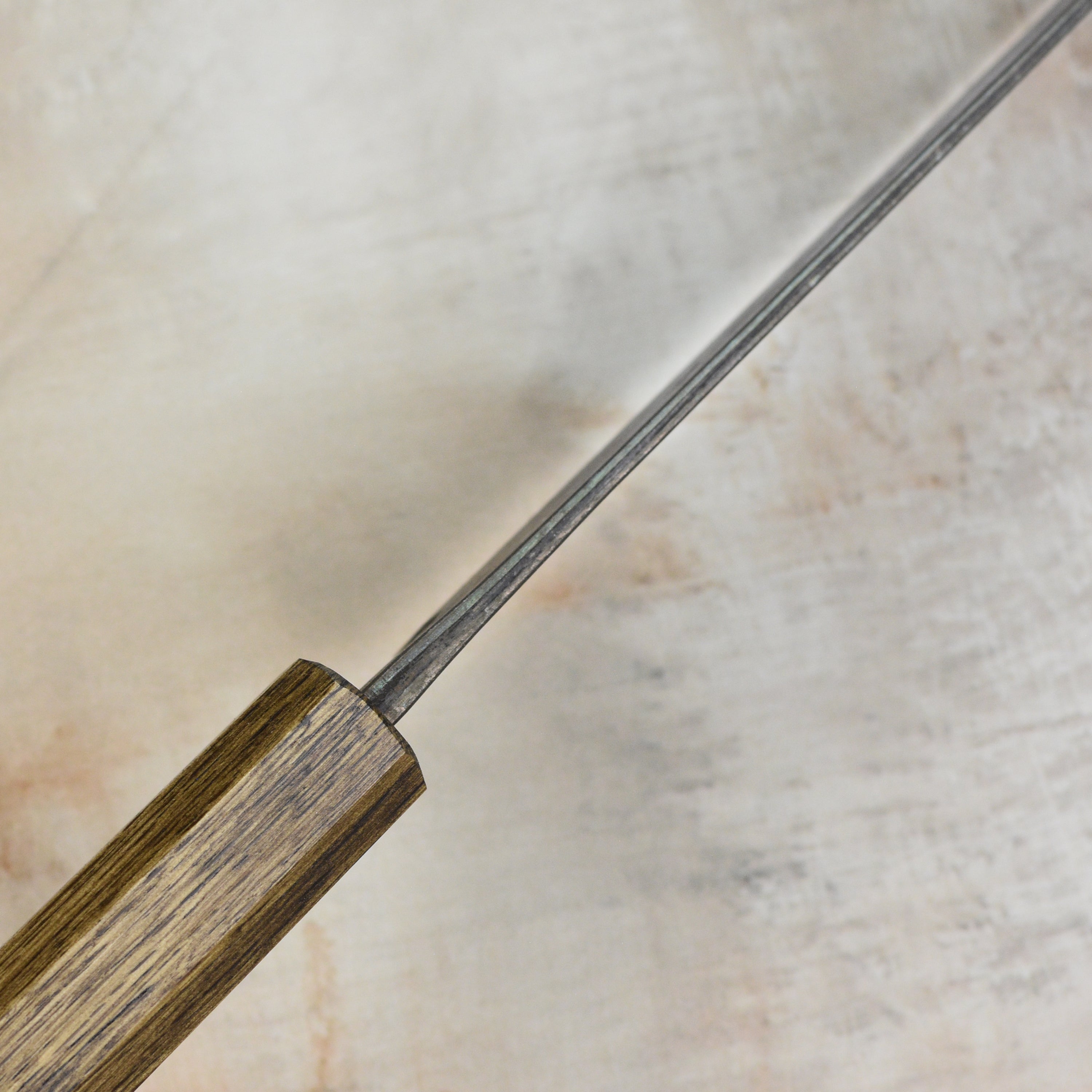 Chef using the Shiro Kamo Aogami Sujihiki Knife for slicing sashimi.