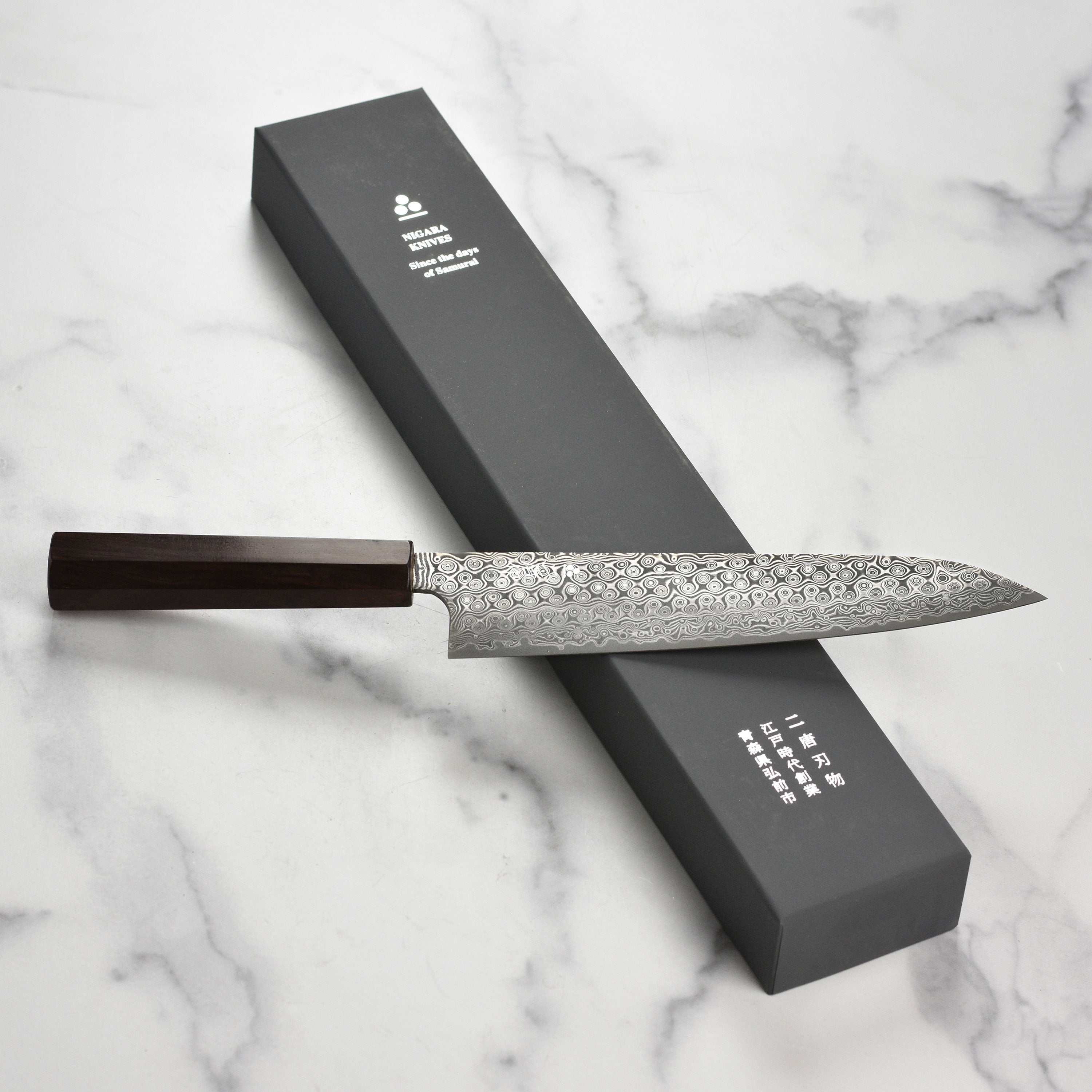 Ergonomic handle and stylish damascus steel blade of the Japanese chef knife