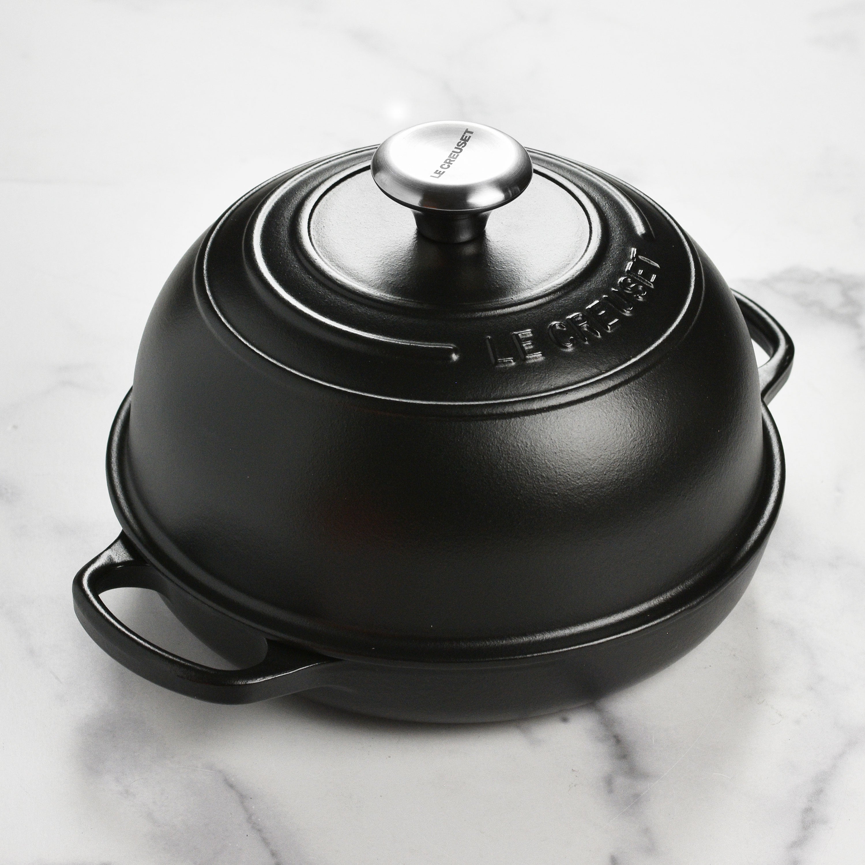 Le Creuset cast iron oven with lid off, showing the interior for baking bread and other baked goods