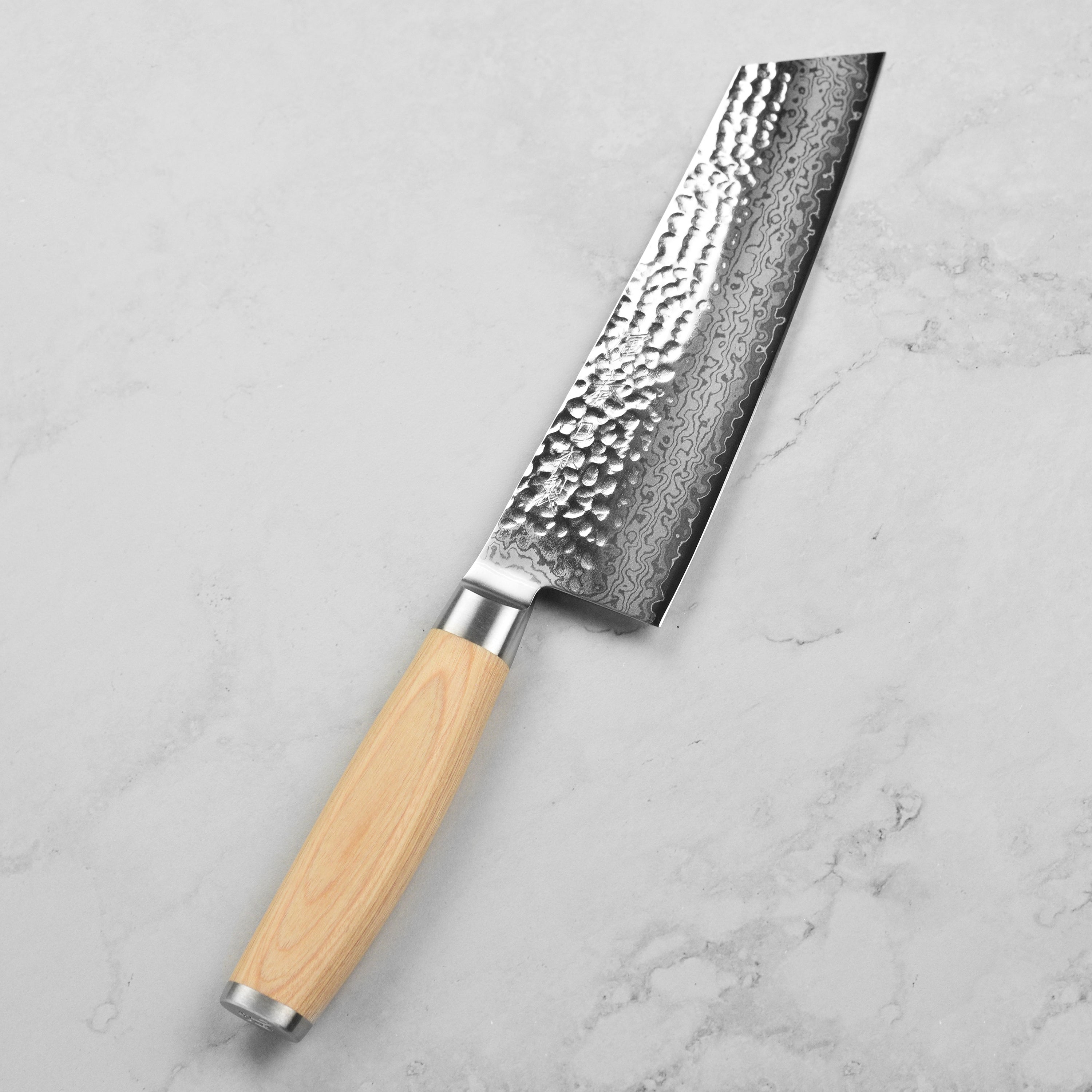 Japanese kitchen knife with handcrafted handle and lifetime warranty