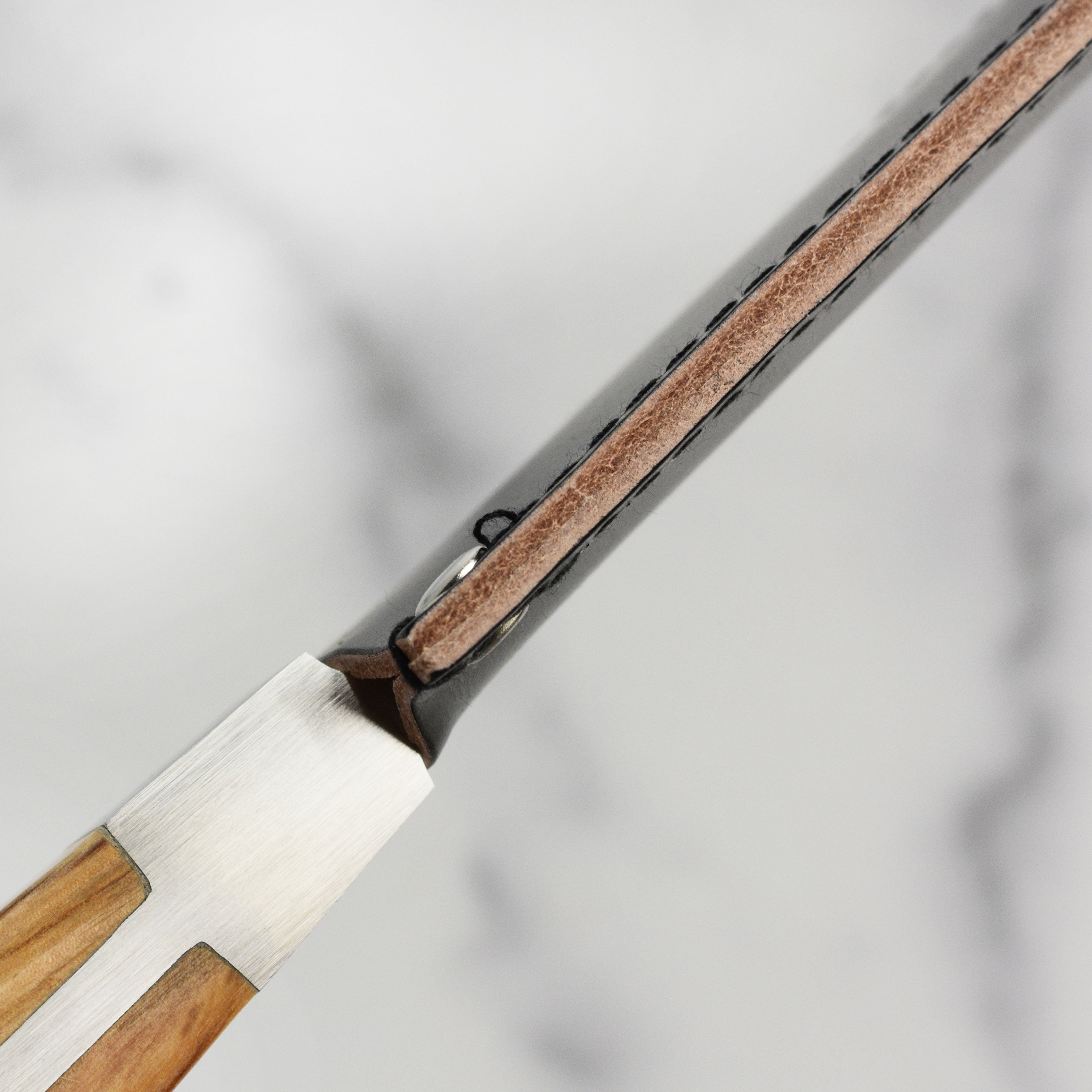 Side view of the premium leather sheath for 12.6" bread knife
