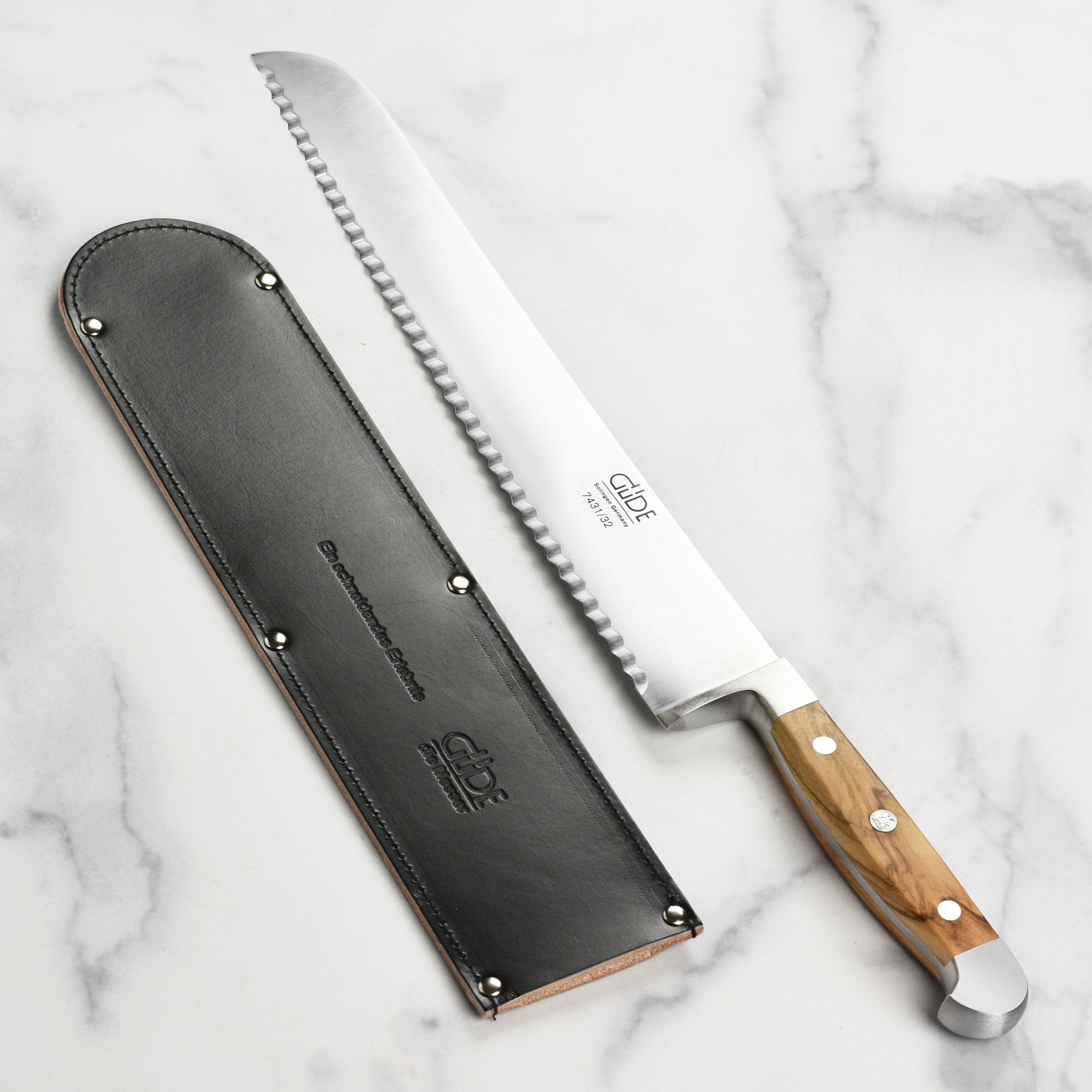 Leather sheath protecting a 12.6" bread knife from damage