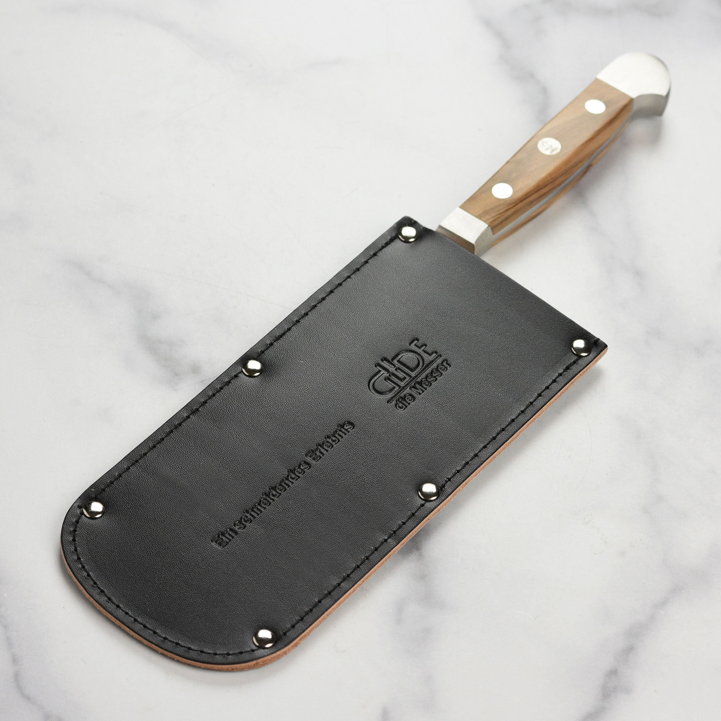 Close-up of Gude 6 inch Chai Dao knife sheath, showing high-quality tanned cowhide material.