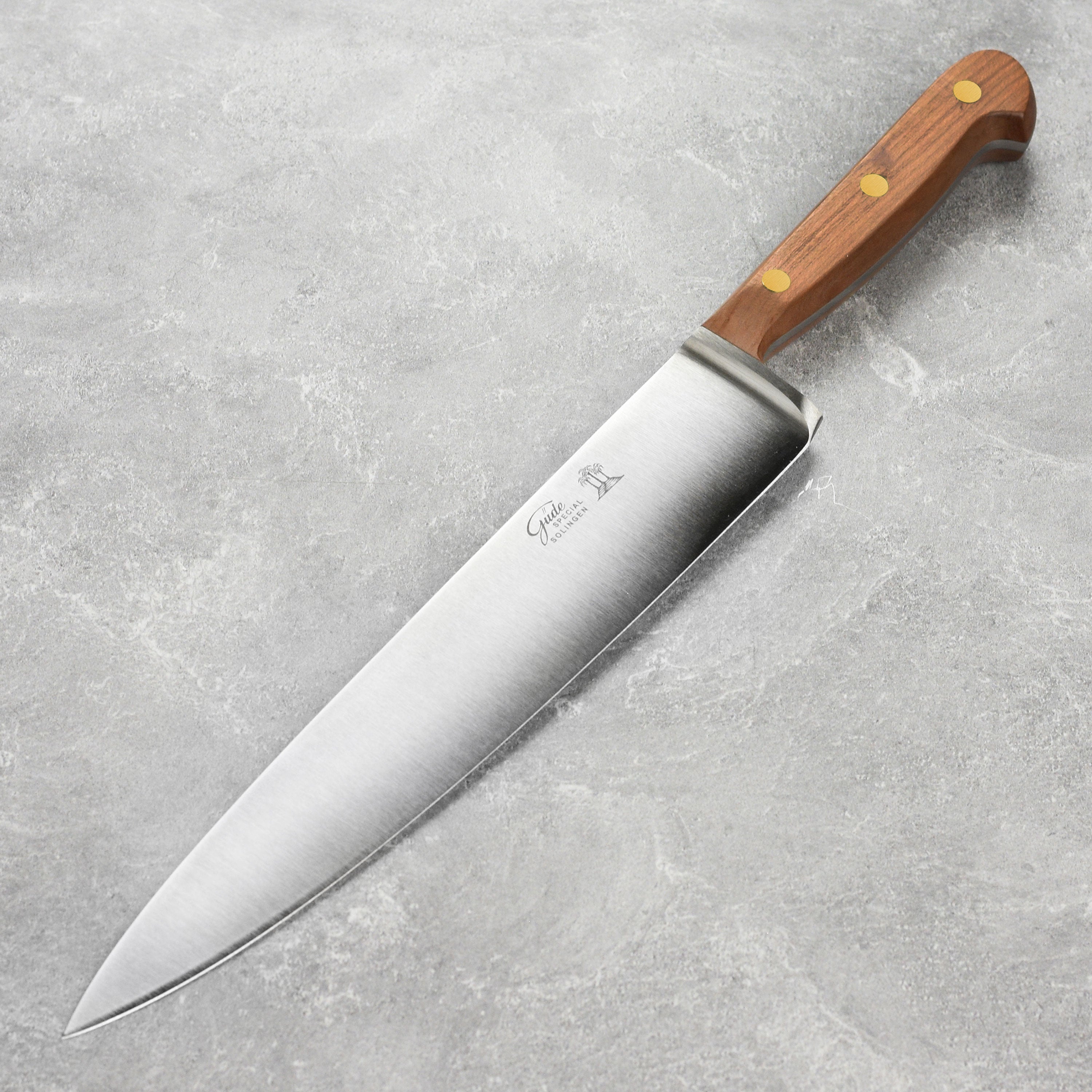 Karl Gude chef's knife showcasing the high carbon steel blade and ergonomic handle