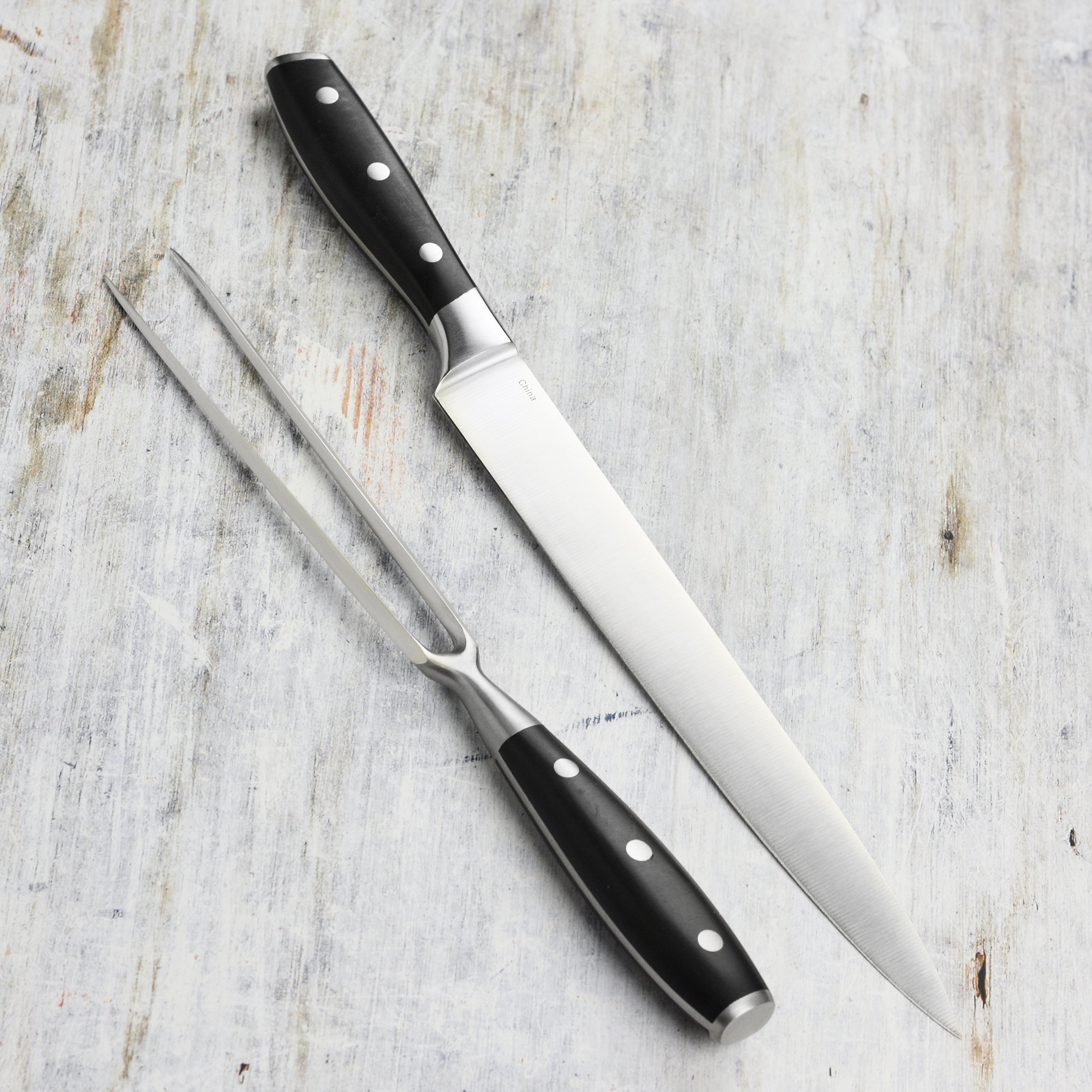 Messermeister Avanta carving set with high-carbon stainless steel blades on a cutting board