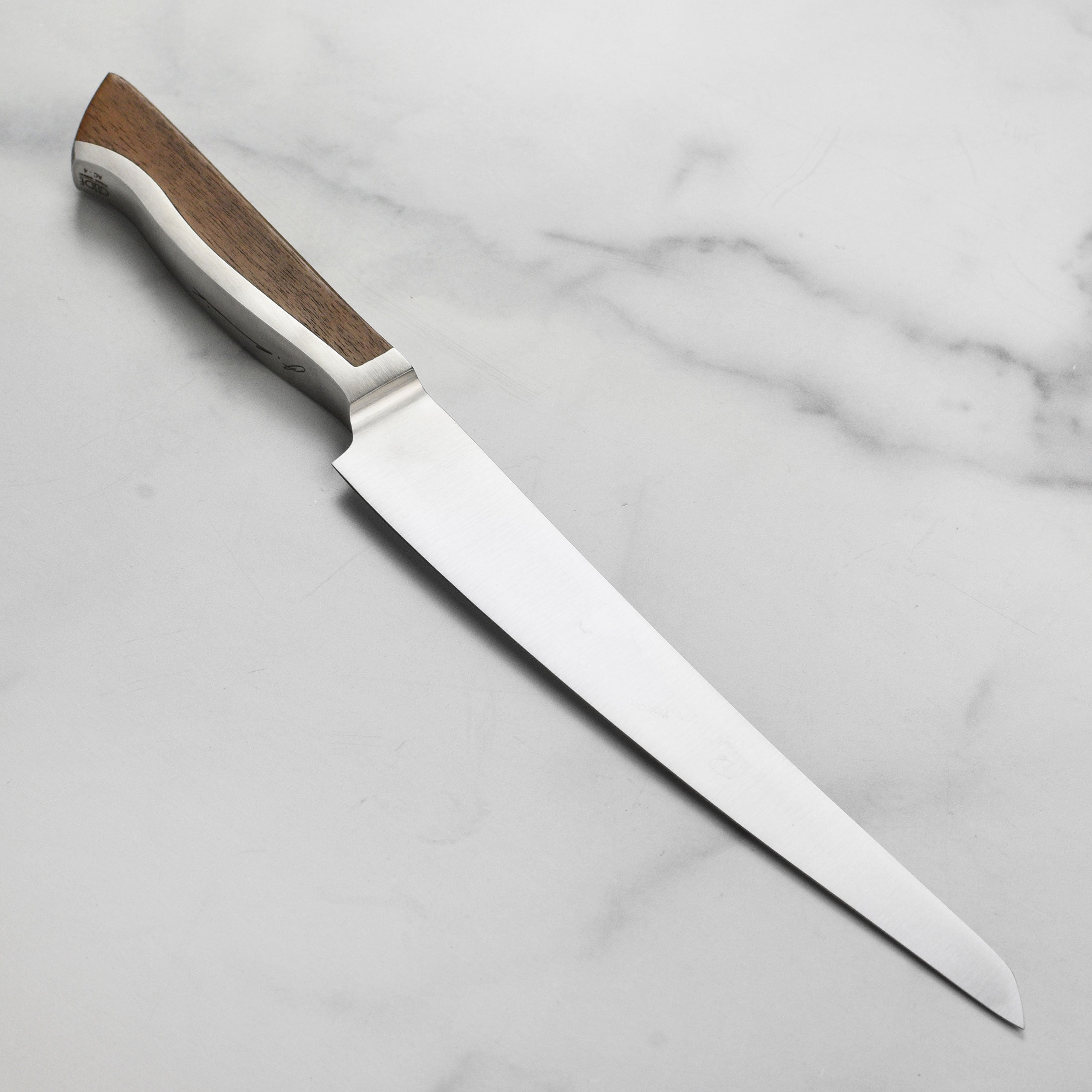Close-up of the high carbon steel blade of the Gude Caminada knife.