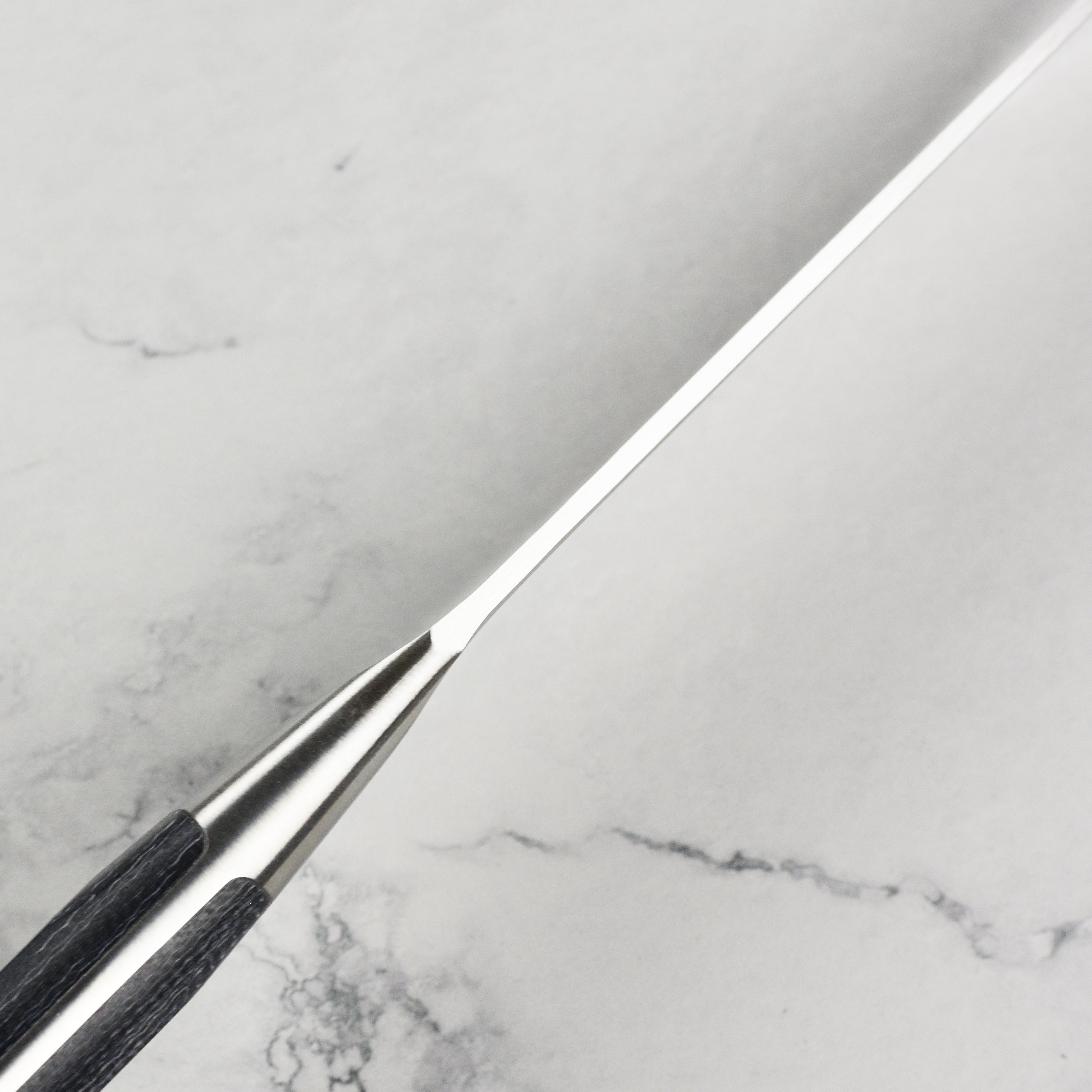 The Zwilling Spectrum 8-inch chefs knife with sharp blade and ergonomic handle for precision cuts