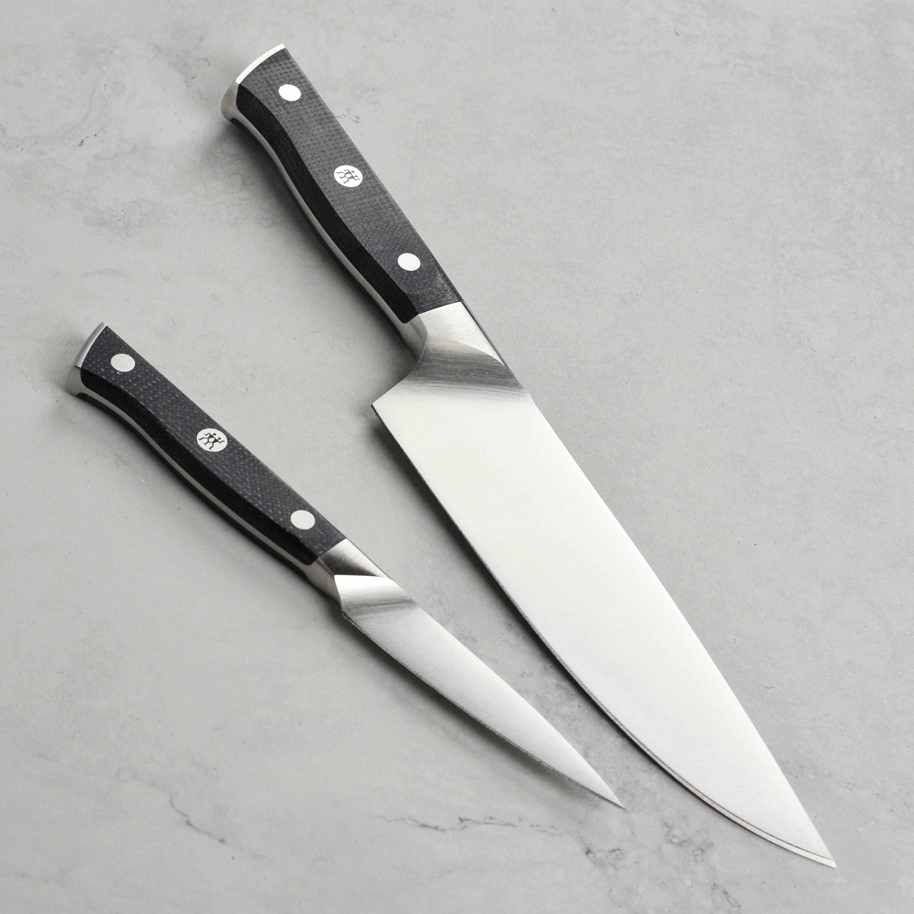 Zwilling Spectrum chef knife with full tang and curved bolster for balanced grip