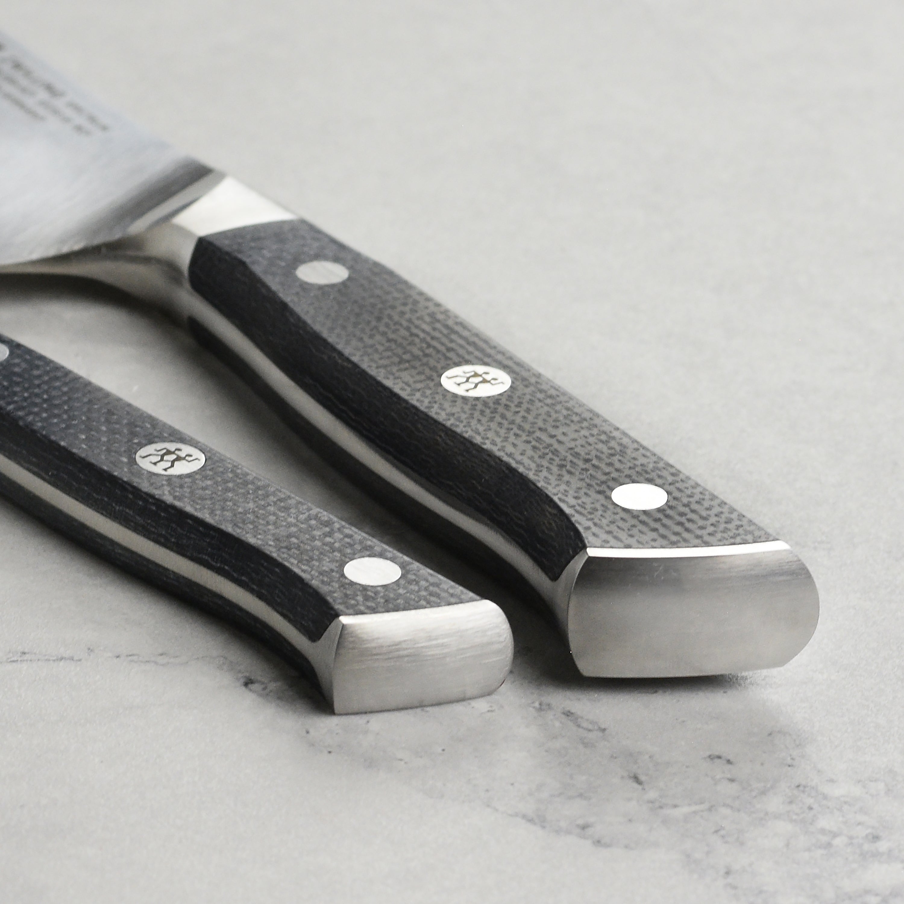 High carbon stainless steel kitchen knife in a modern kitchen setting