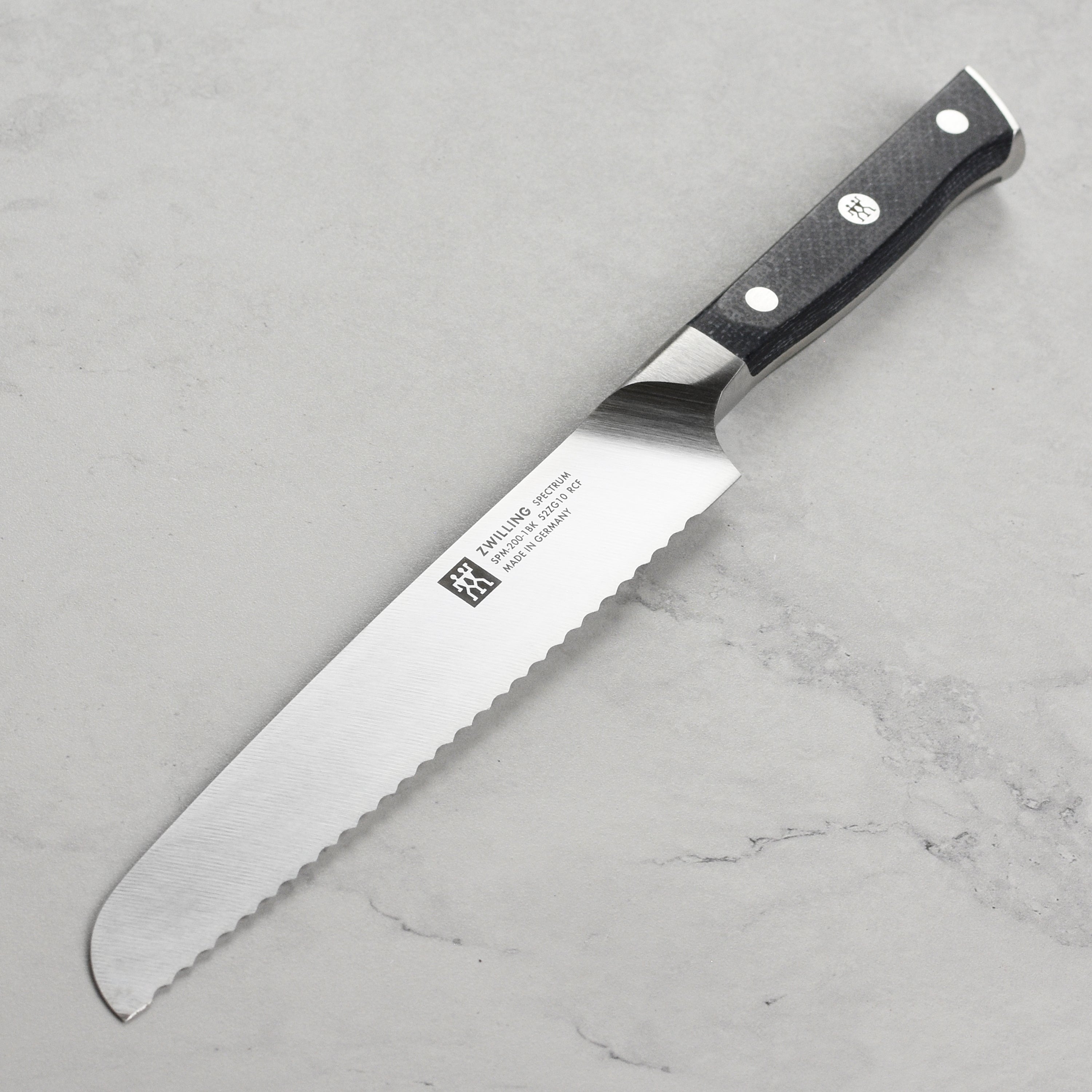 Back view of Zwilling Spectrum 8-inch bread knife with full tang handle