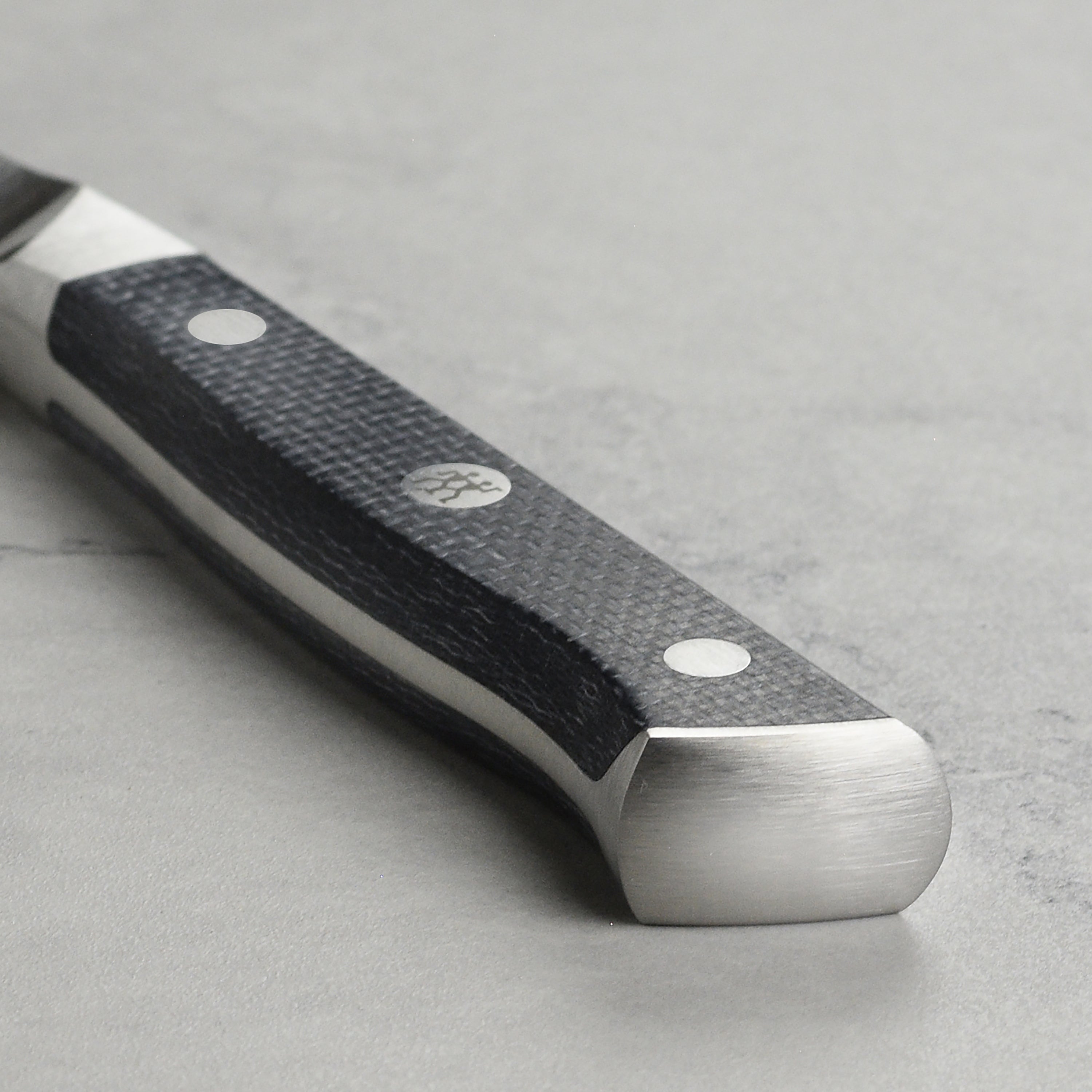 German-made Zwilling utility knife with full tang and moisture-resistant handle