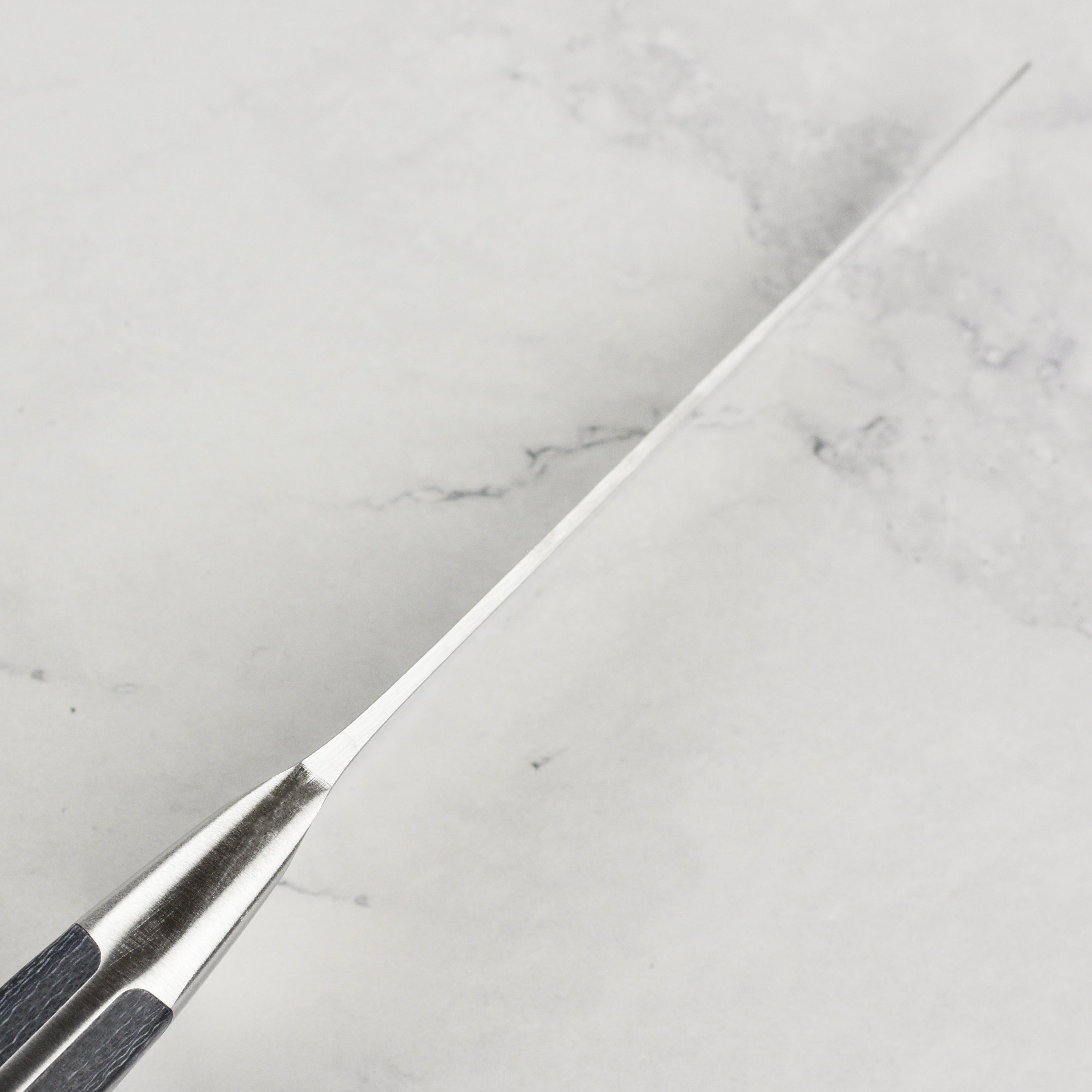 German-made Zwilling utility knife with full tang and moisture-resistant handle
