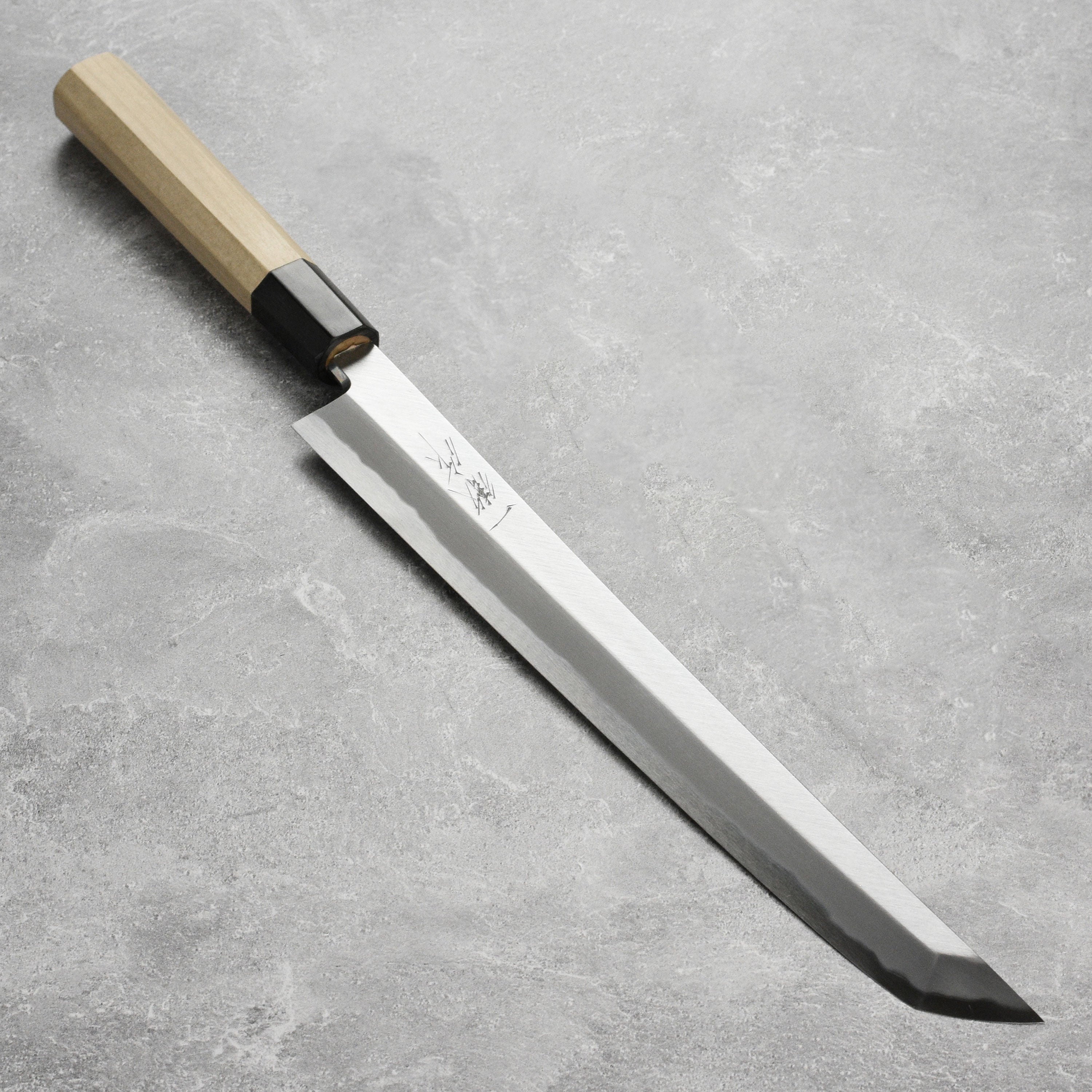 Ittetsu Tanaka Shirogami Takohiki Knife showcasing its sleek design and craftsmanship.