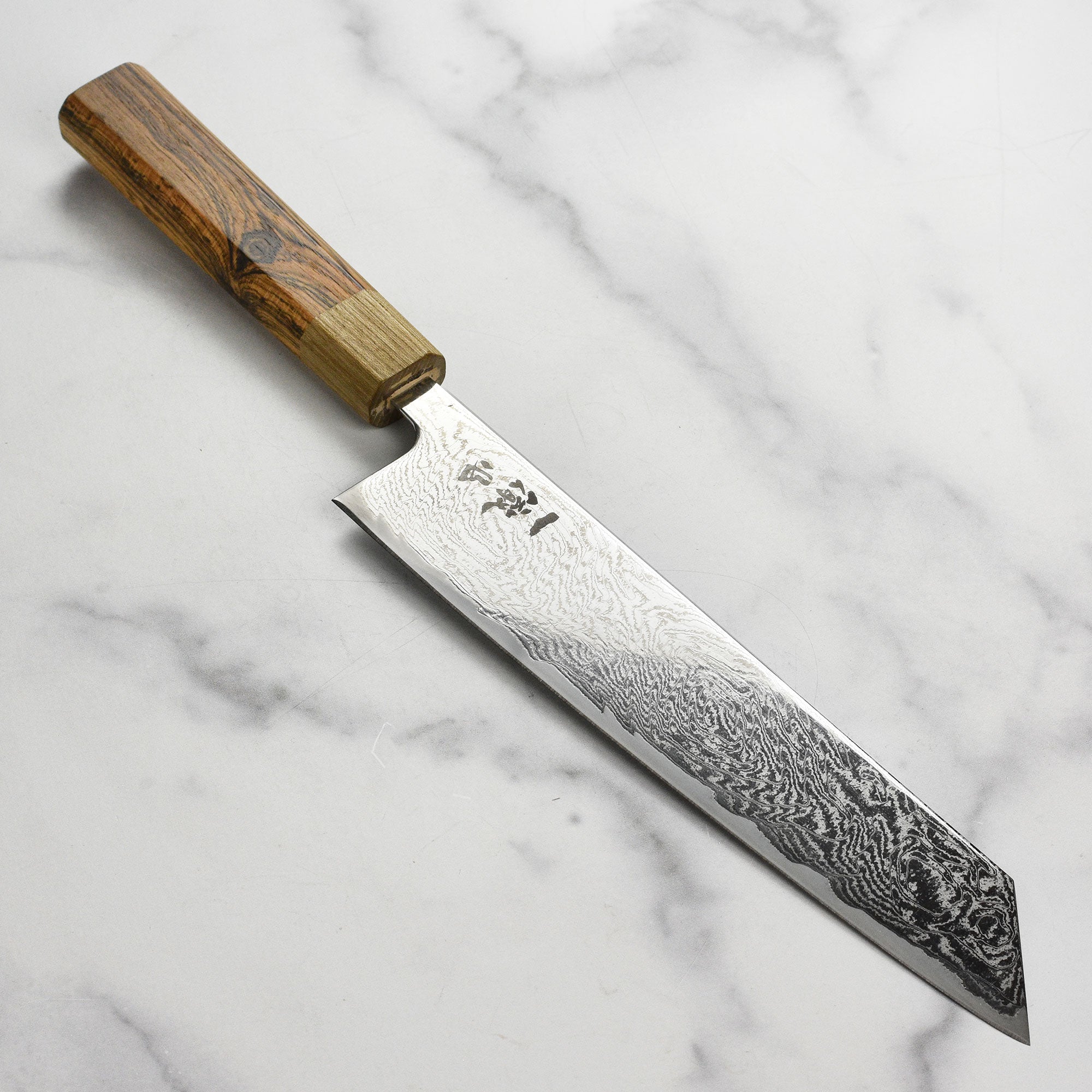 Ittetsu AUS10 Spiral Damascus Kiritsuke knife with detailed Damascus pattern for professional chefs