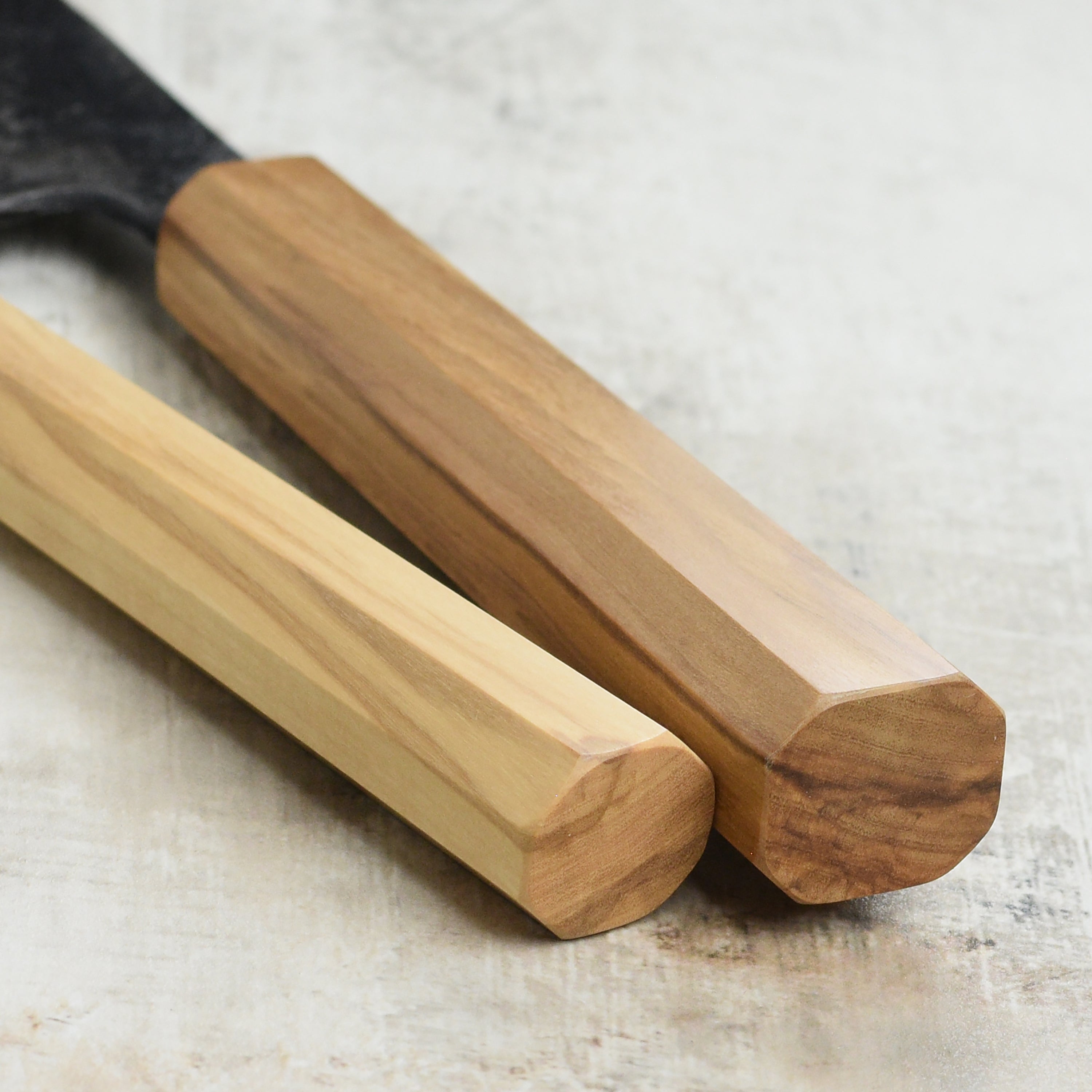 Close-up of the ergonomic handle of the bunka knife, highlighting its comfortable grip and craftsmanship.