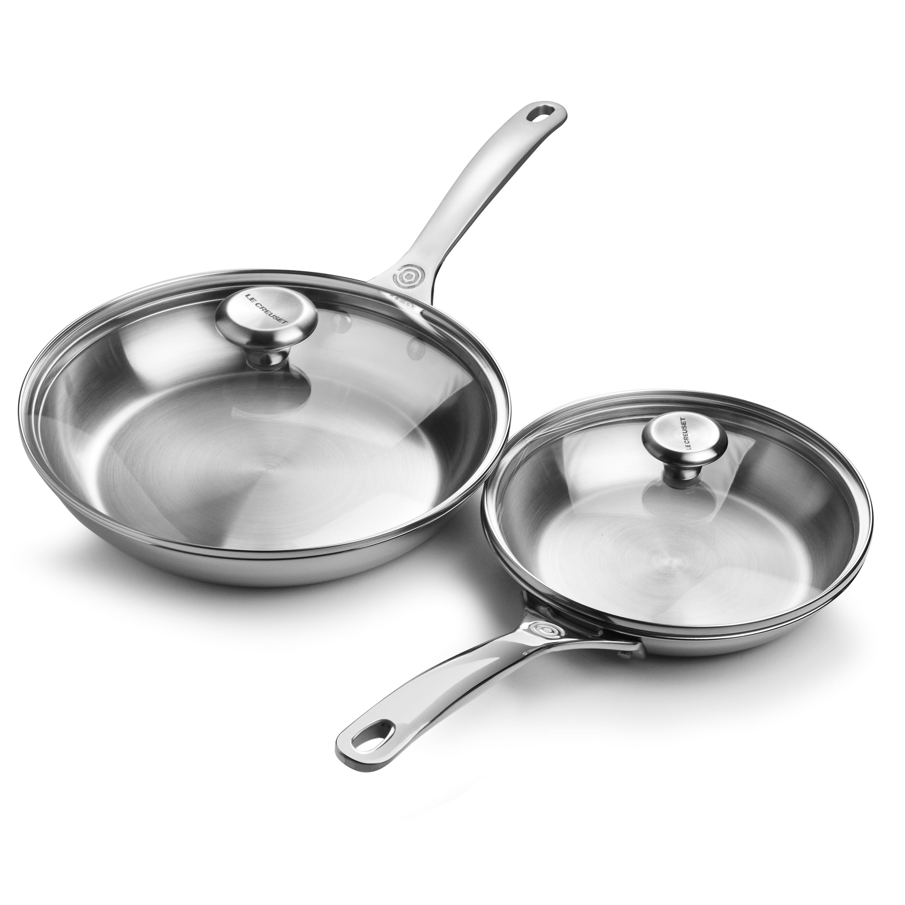Close-up of stainless steel skillet with lid and stay-cool handle