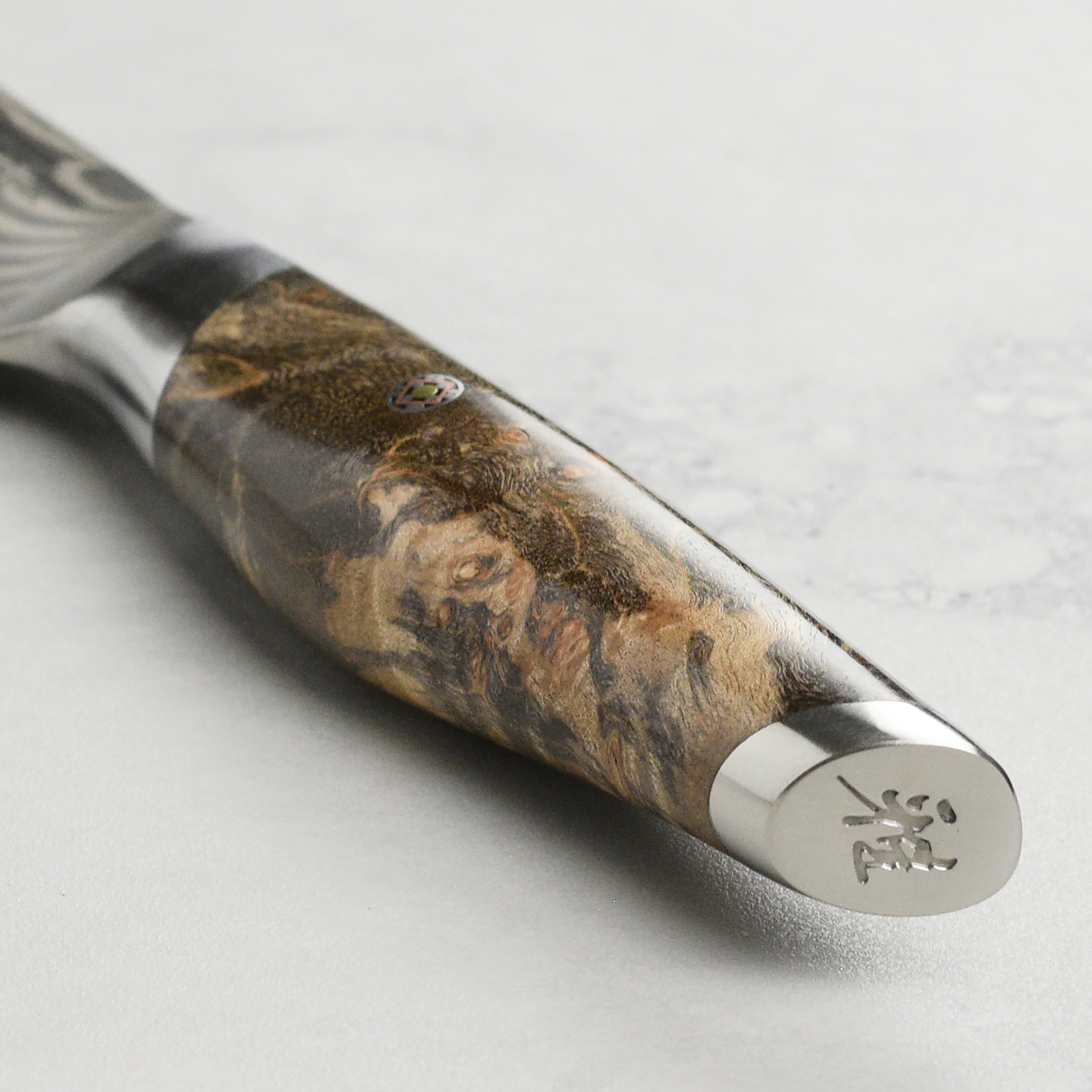 Handcrafted Maple Burl handle on Miyabi Iki anniversary chefs knife