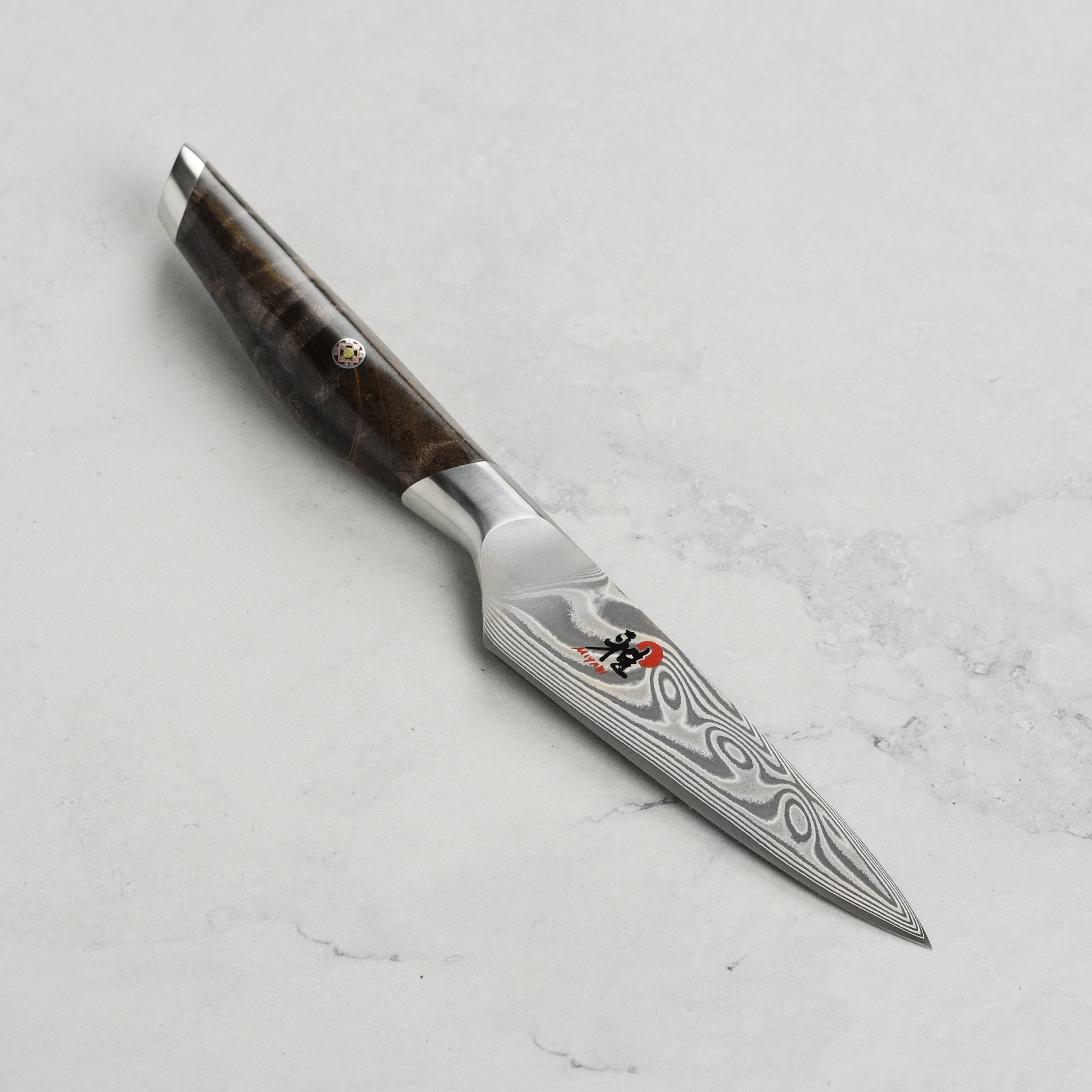 Miyabi Iki Damascus paring knife blade with moonlight pattern and sharp tip
