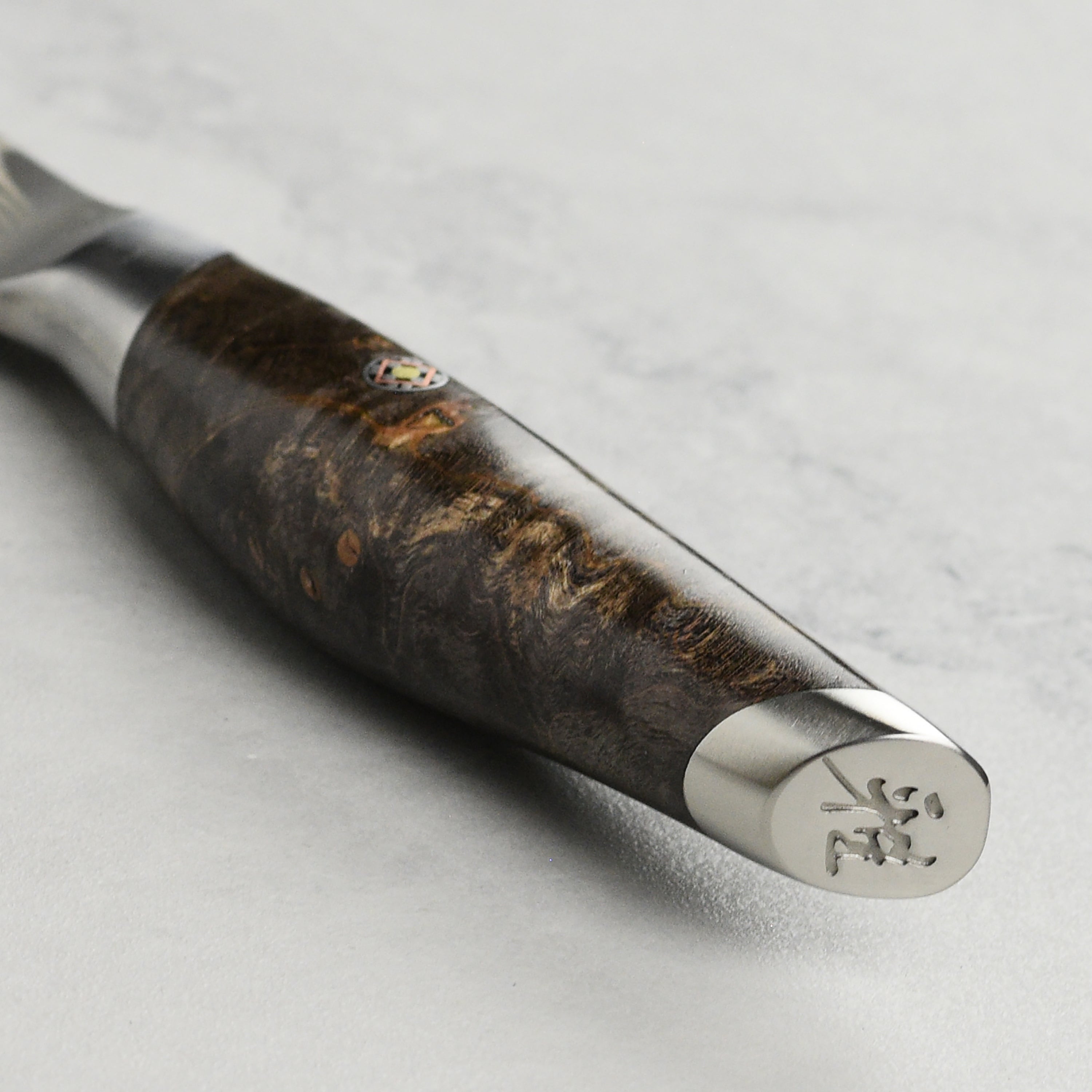 Handcrafted Japanese kitchen knife with Maple Burl handle and glass coating