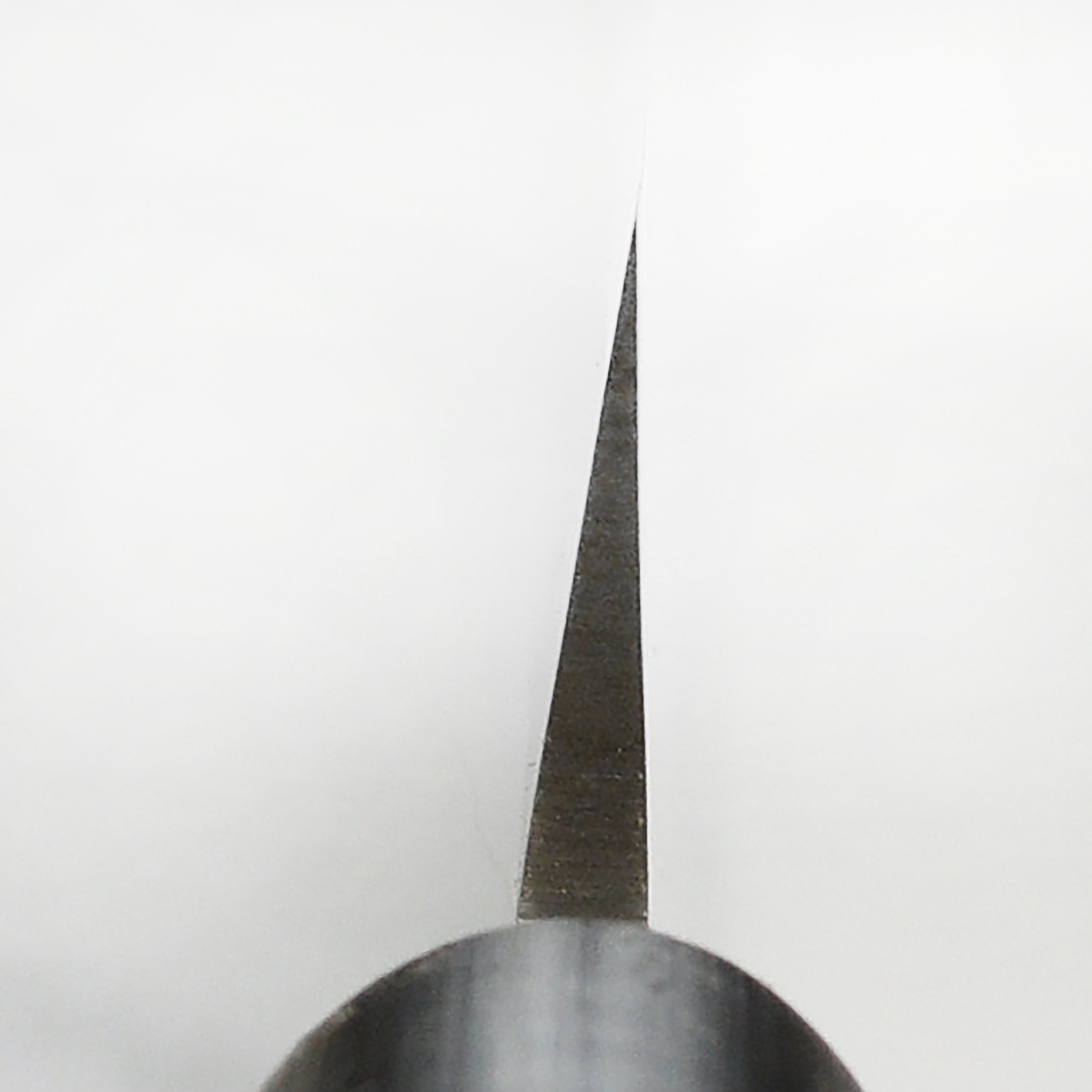 Side view of the Tojiro MV Stainless 9.4" Yanagiba with detailed blade craftsmanship