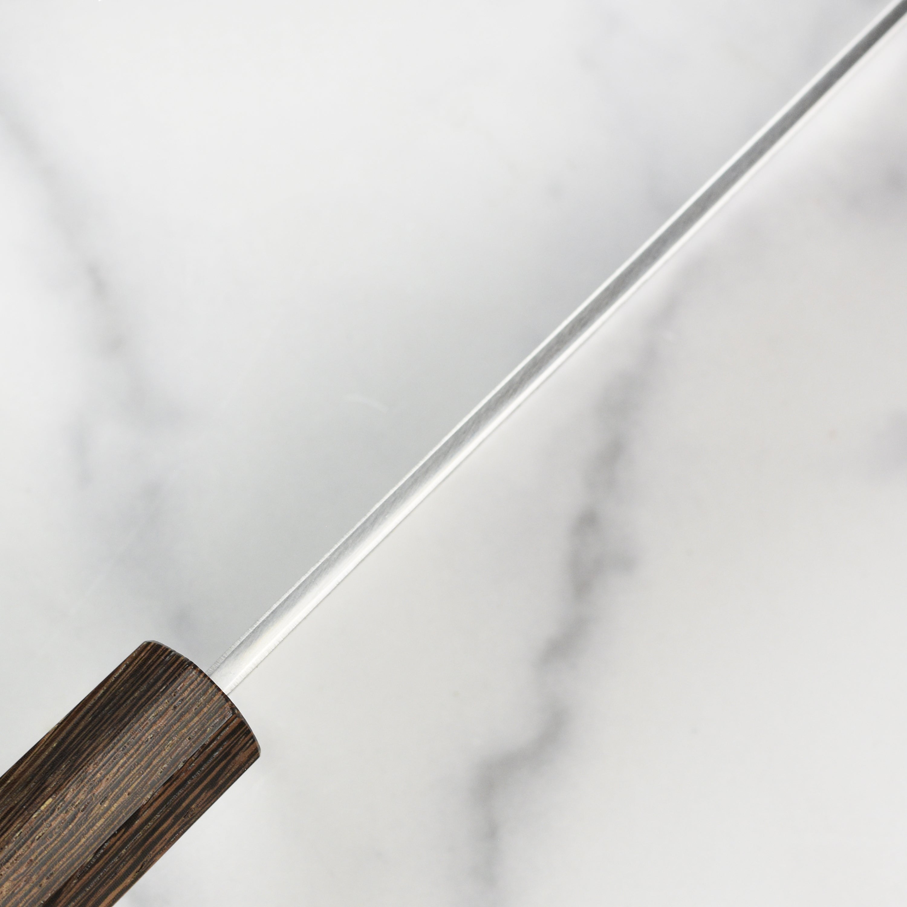 Detailed view of the handle and blade craftsmanship of the Japanese knife