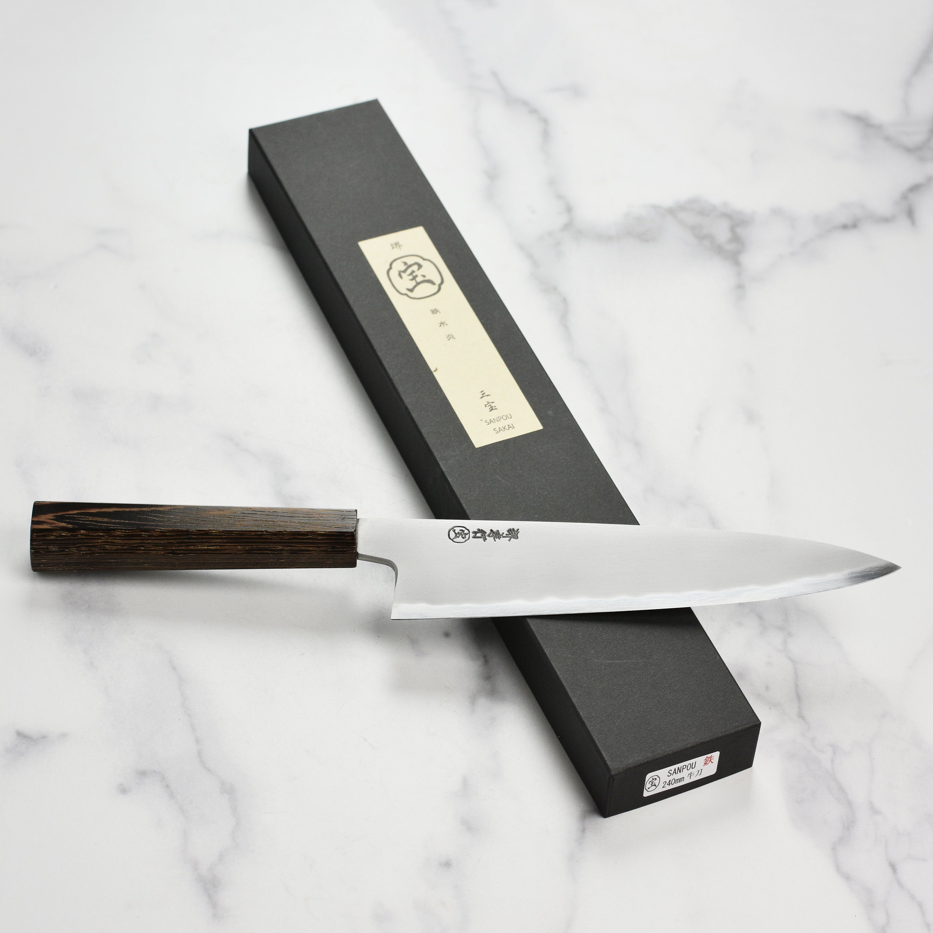 Detailed view of the handle and blade craftsmanship of the Japanese knife