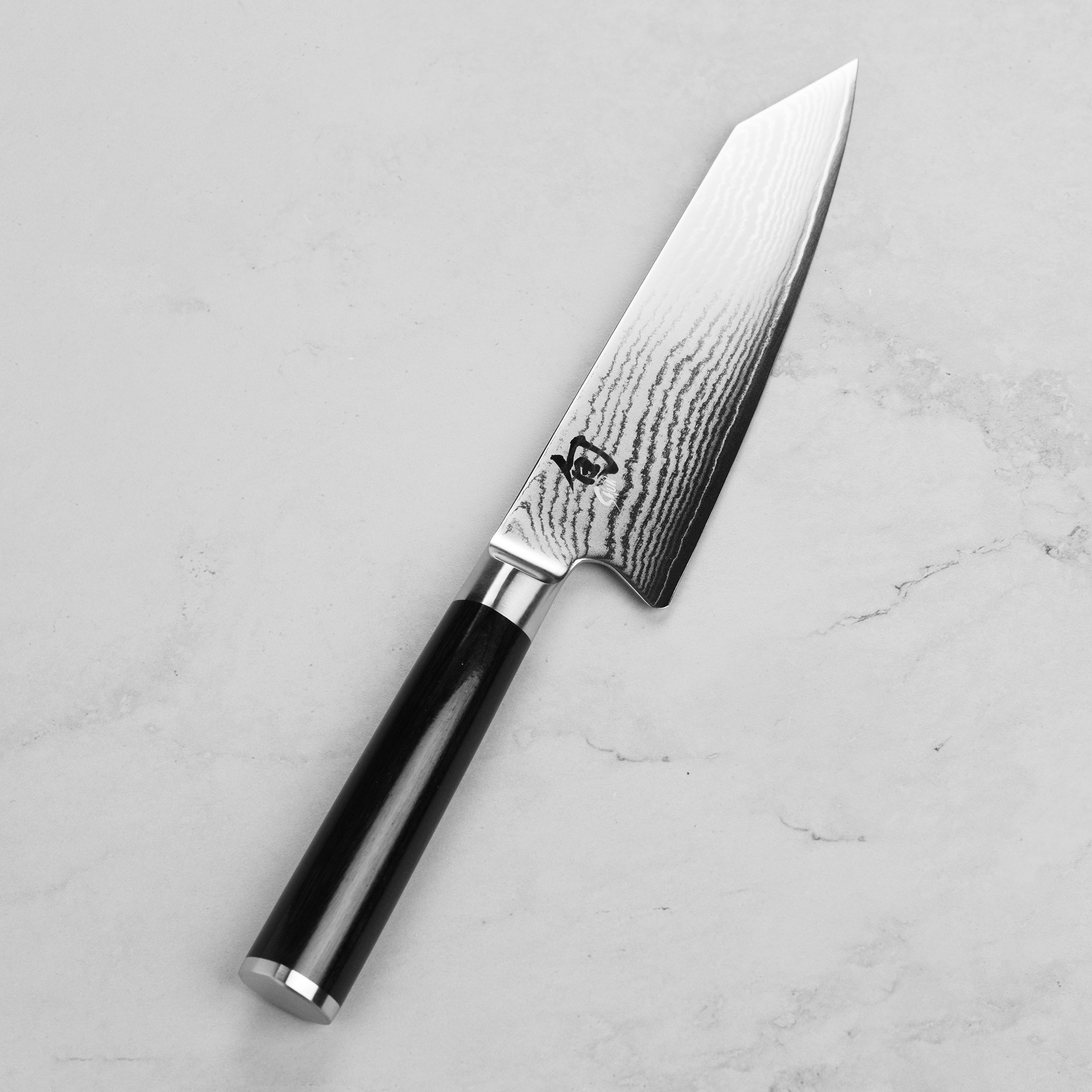 Premium 6-Inch Handcrafted Japanese Bunka Knife displayed on a wooden cutting board, ideal for culinary tasks.