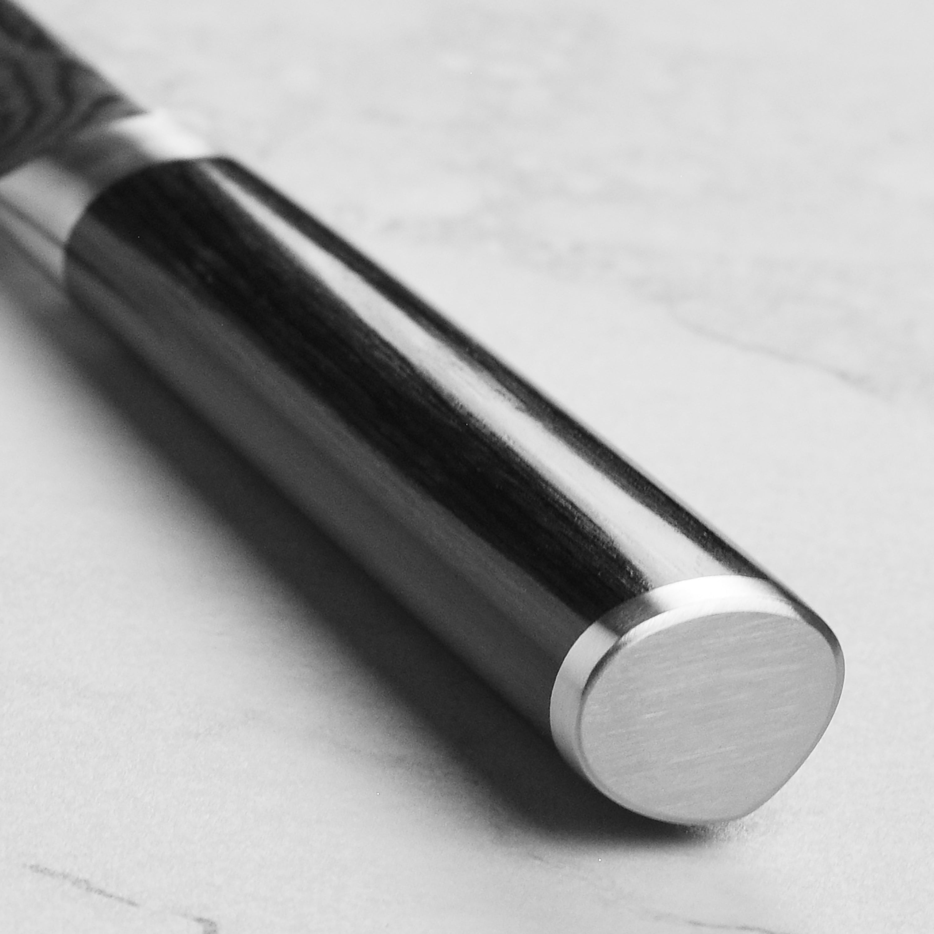 Premium 6-Inch Handcrafted Japanese Bunka Knife with D-shaped ebony PakkaWood handle.