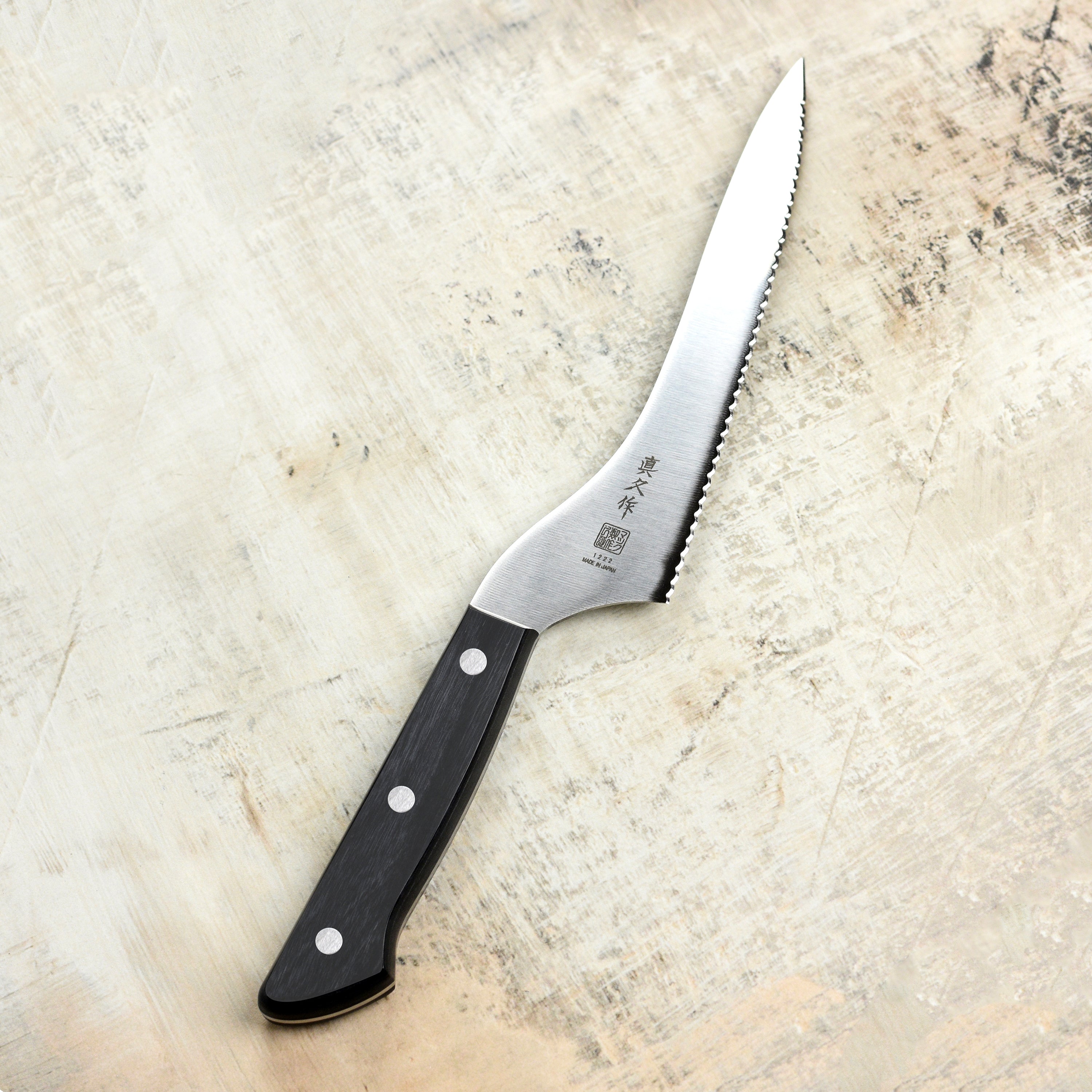 Offset bread knife slicing bread with precision and ease