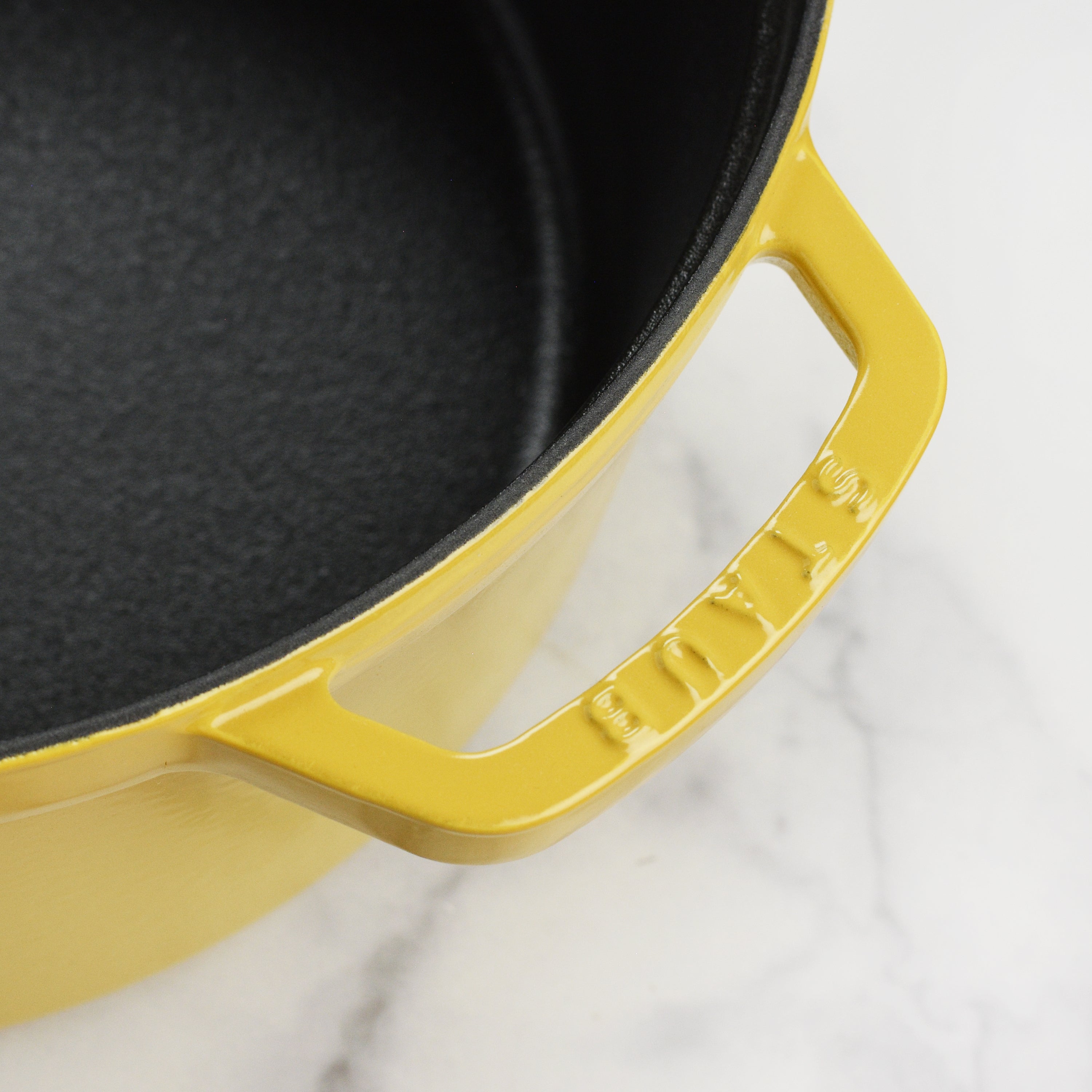 Dutch oven on stovetop, showcasing heat distribution and versatility