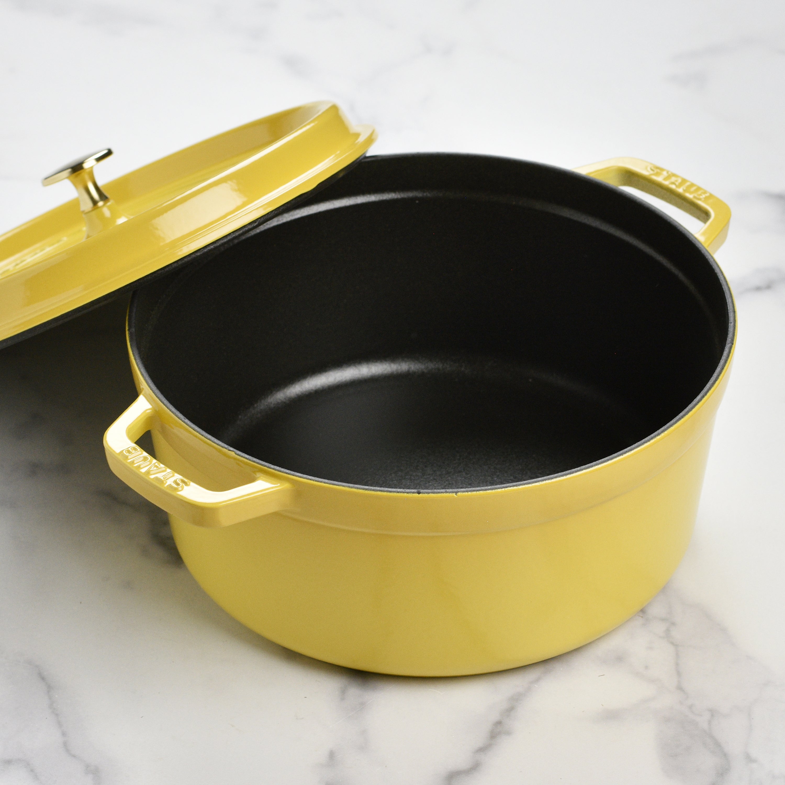 Close-up of the textured interior and lid of the Dutch oven for baking bread