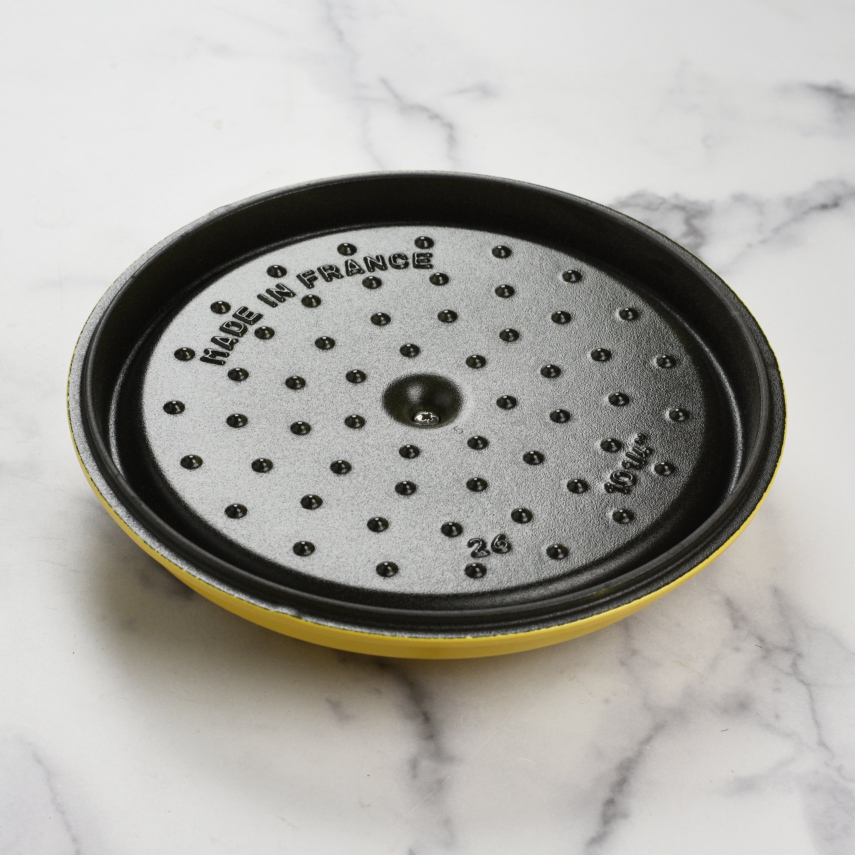 Le Creuset 5.5-quart Dutch oven with citron enamel finish, front view